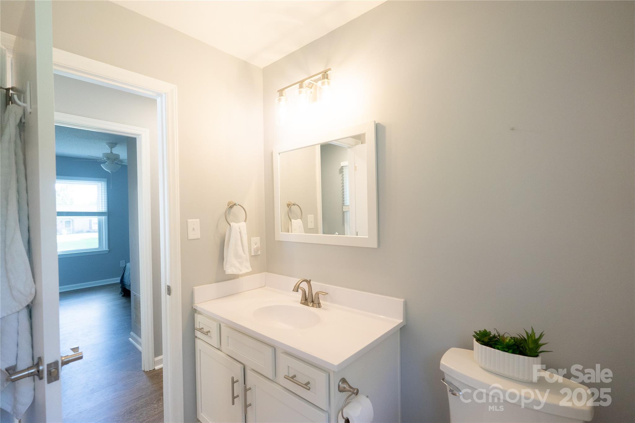 8012 Red Lantern Road Indian Trail, NC 28079 - Photo 13 of 33 a bathroom with a sink and a mirror