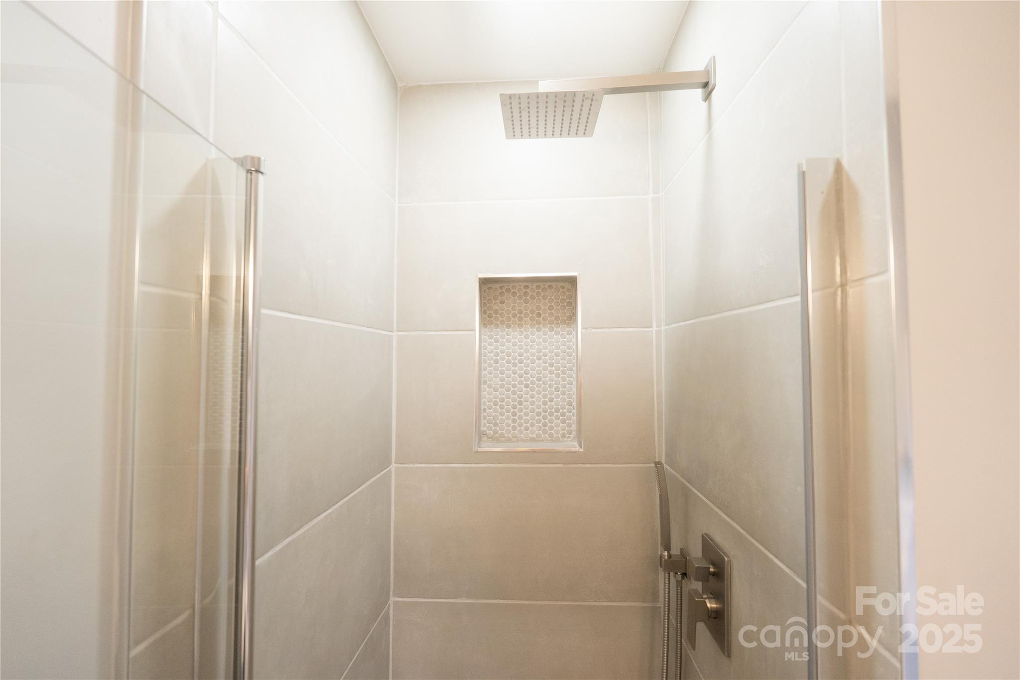 8012 Red Lantern Road Indian Trail, NC 28079 - Photo 17 of 33 a bathroom with a shower