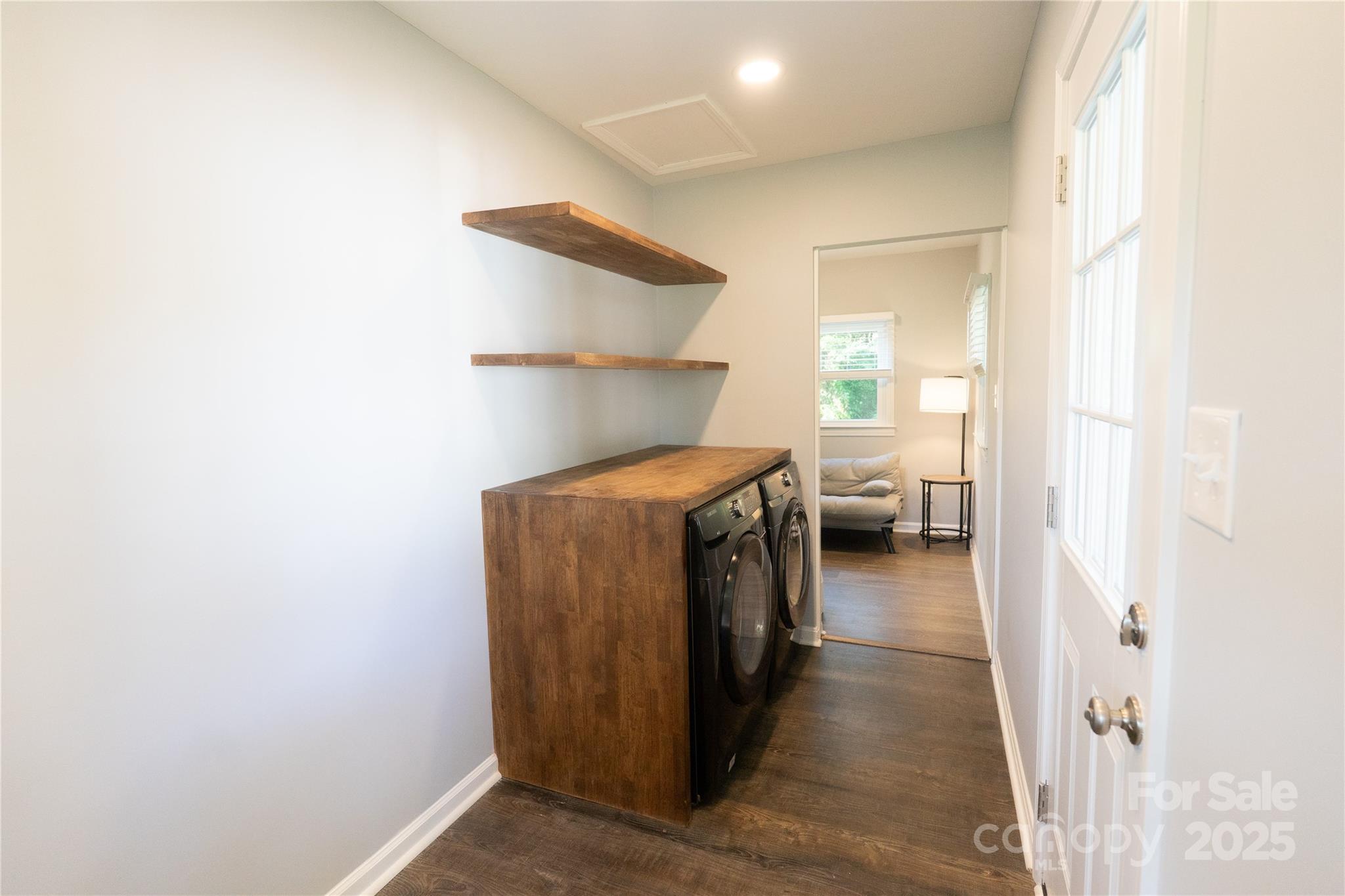 8012 Red Lantern Road Indian Trail, NC 28079 - Photo 19 of 33 a hallway with a washer and dryer