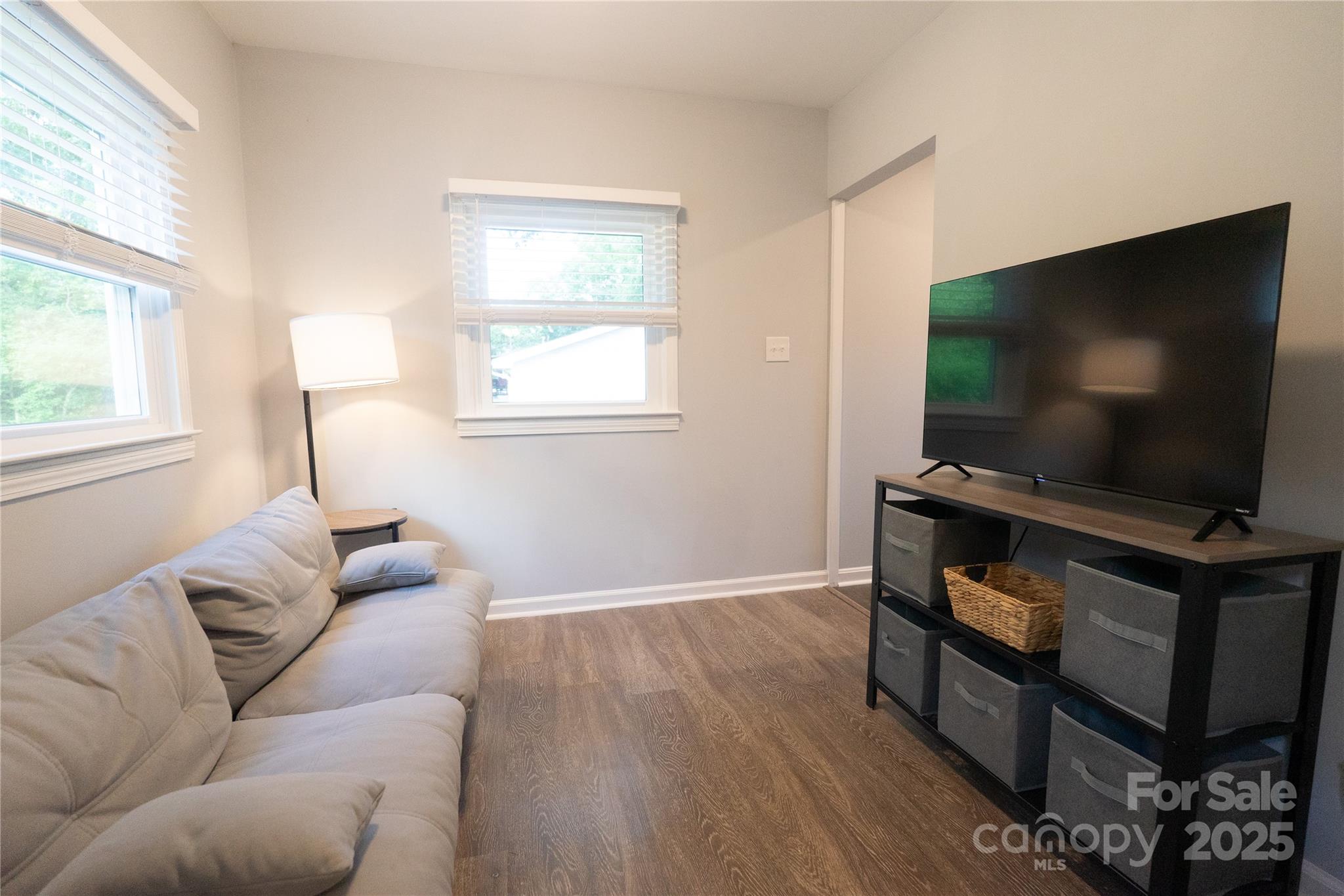 8012 Red Lantern Road Indian Trail, NC 28079 - Photo 23 of 33 a living room with furniture and a flat screen tv