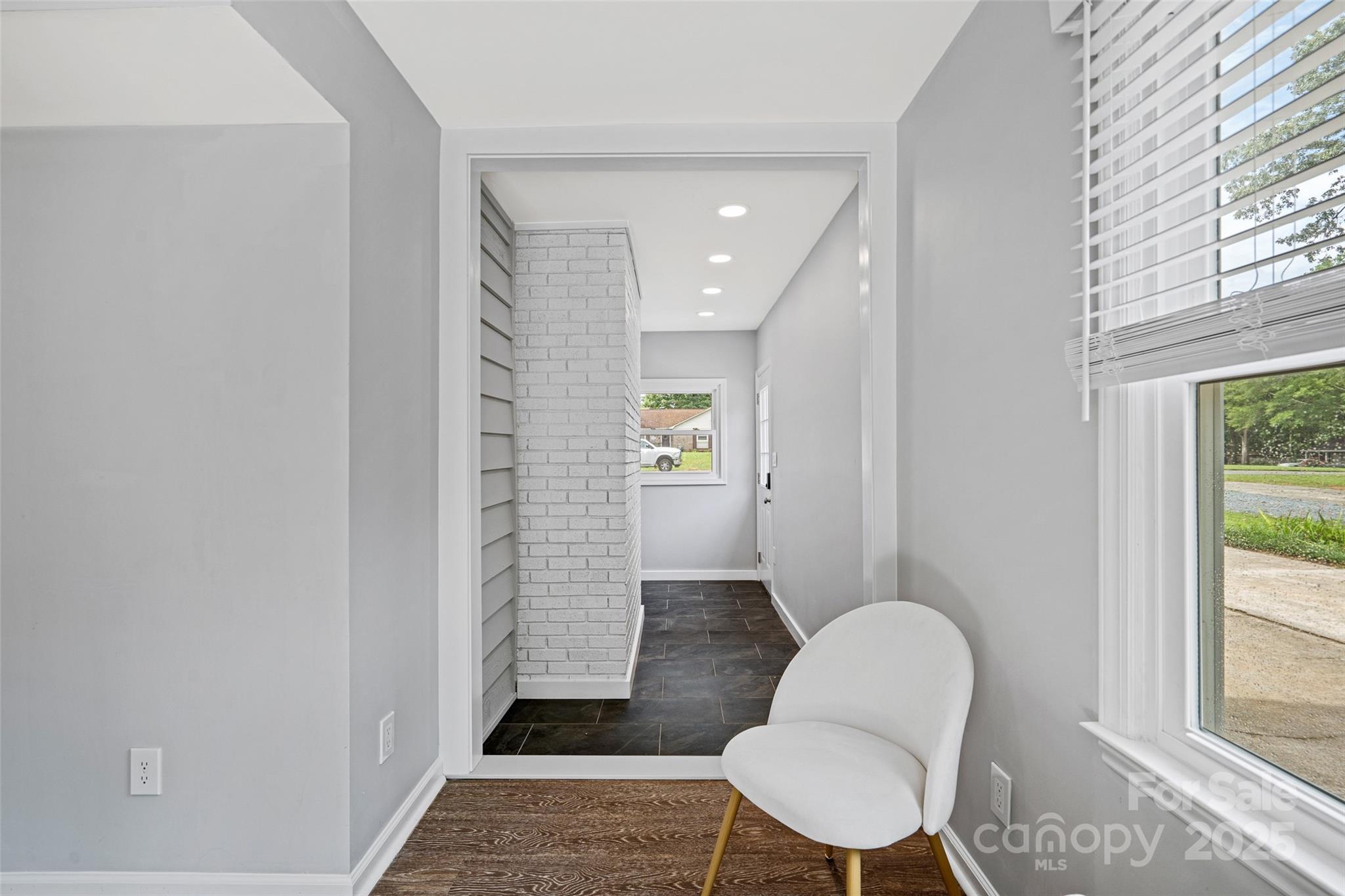 8012 Red Lantern Road Indian Trail, NC 28079 - Photo 26 of 33 a bathroom with a sink a toilet a rug and a window
