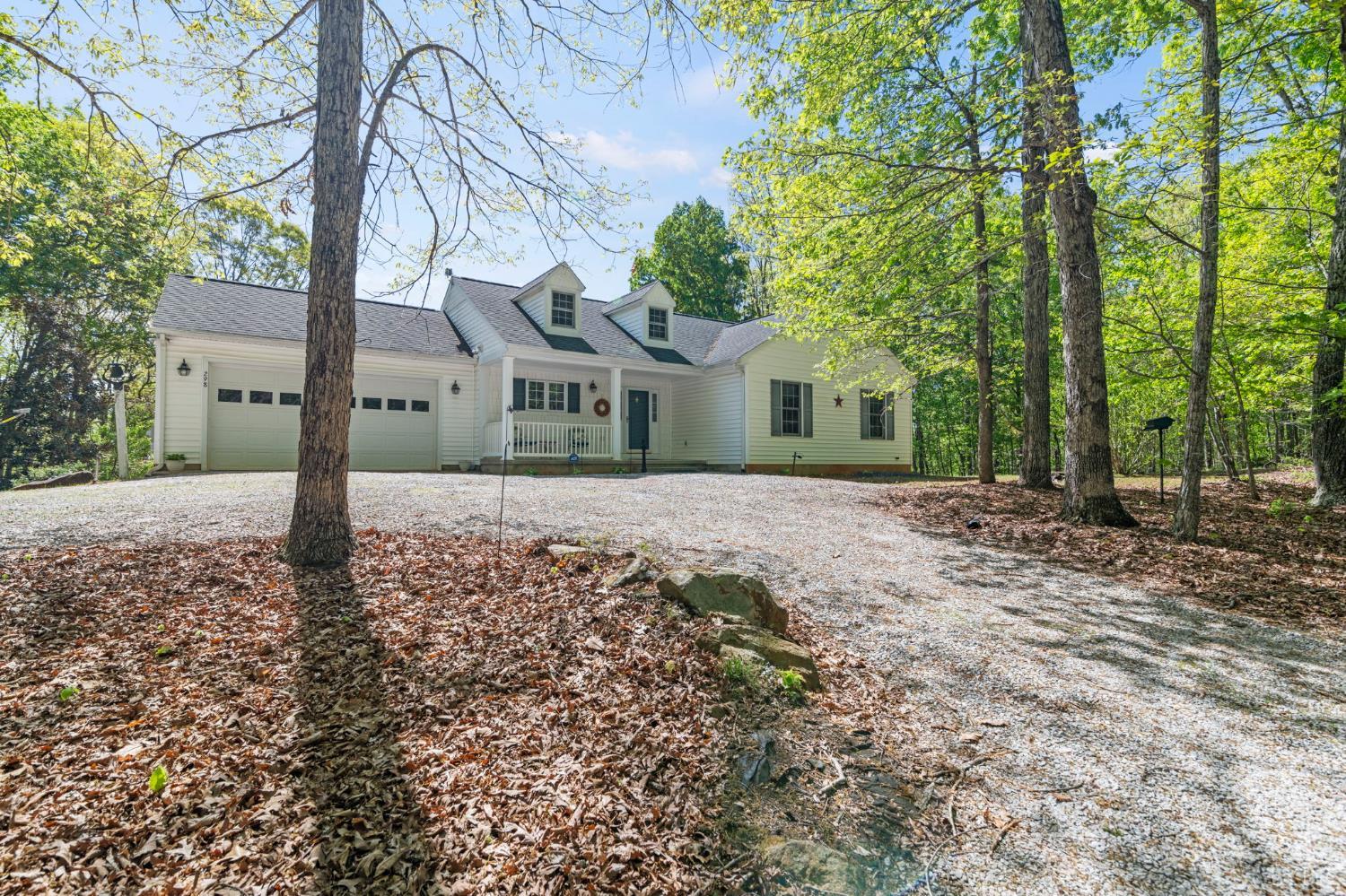 298 Braxton Ridge Road Amherst, VA 24521 - Photo 4 of 65 a front view of a house with a yard