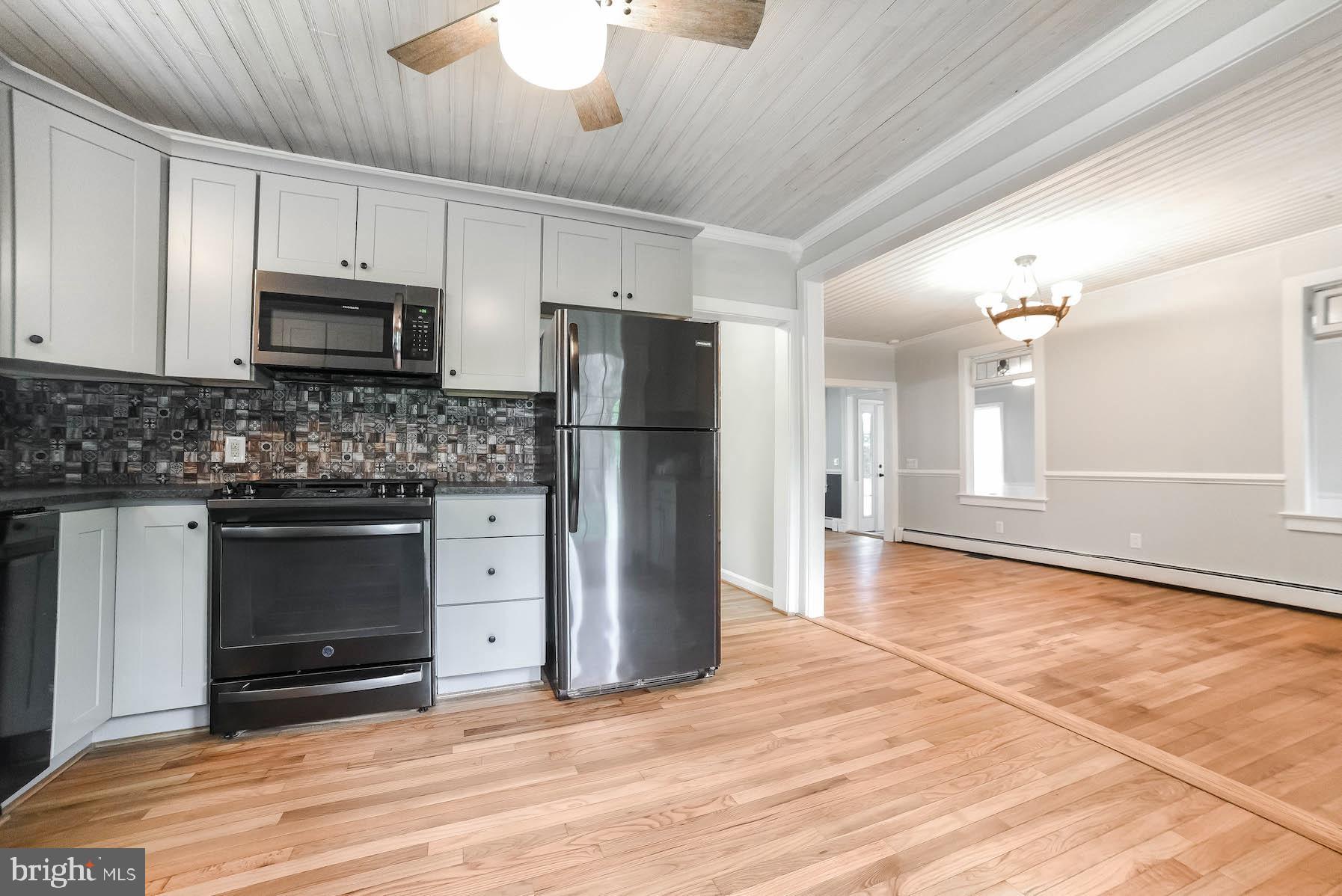 45054 Trooper's Road Tall Timbers, MD 20690 - Photo 13 of 73 Kitchen open to dining room