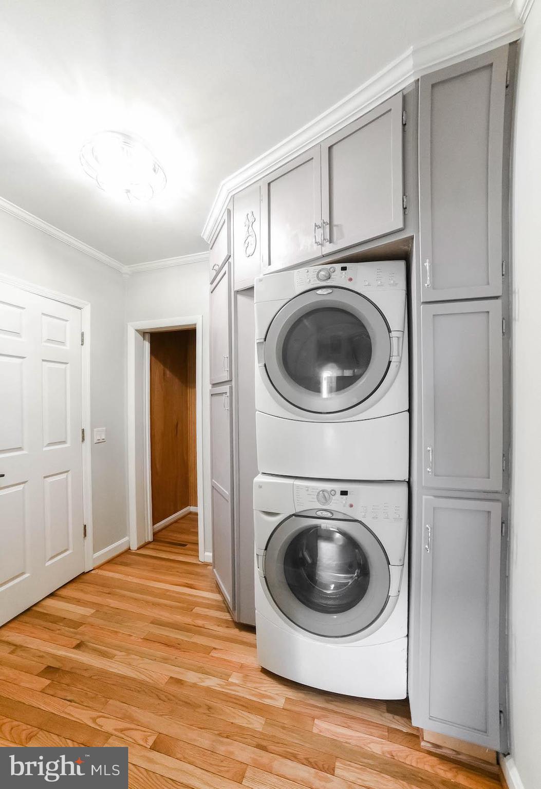 45054 Trooper's Road Tall Timbers, MD 20690 - Photo 14 of 73 Laundry area w/storage cabinets right off kitchen