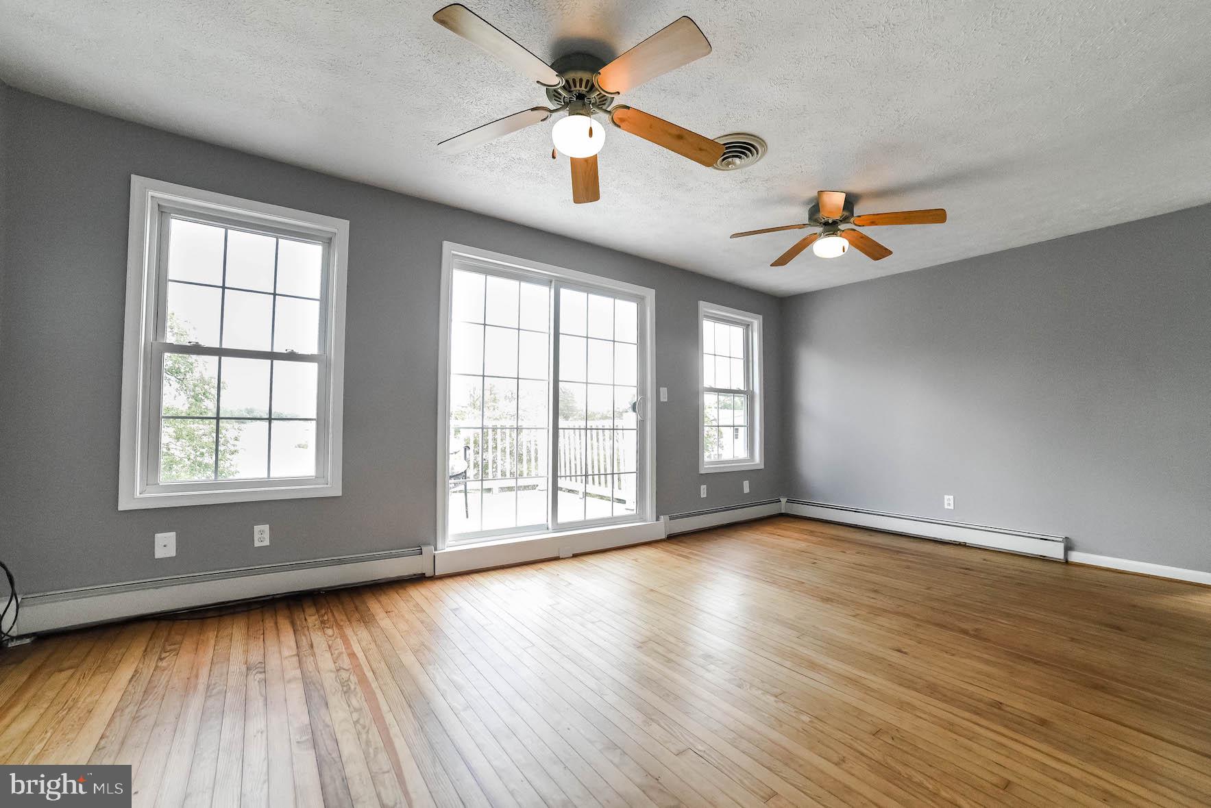 45054 Trooper's Road Tall Timbers, MD 20690 - Photo 29 of 73 Master bedroom double door leads to balcony