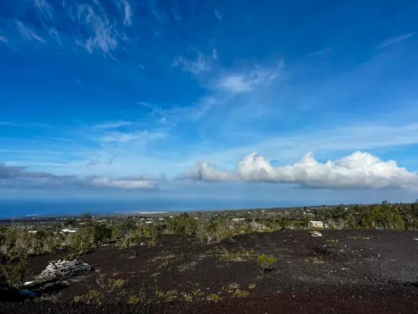 a view of a lake and sunset