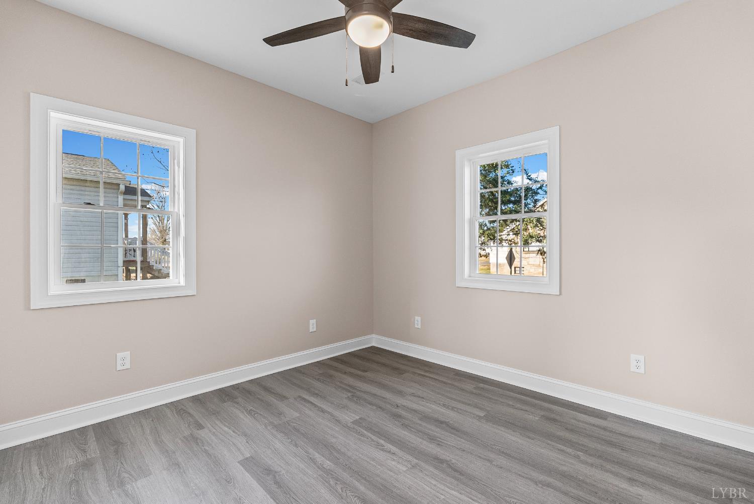1303 4th Street Altavista, VA 24517 - Photo 16 of 36 a view of an empty room with window and wooden floor