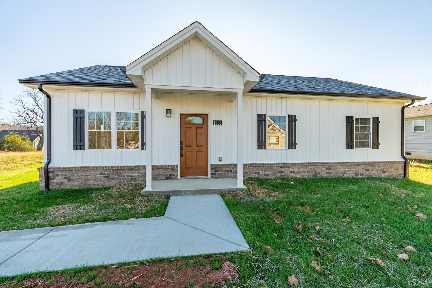 1303 4th Street Altavista, VA 24517 - Photo 20 of 36 a front view of a house with garden