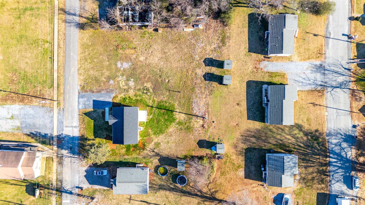 1303 4th Street Altavista, VA 24517 - Photo 30 of 36 a aerial view of multiple houses with outdoor space