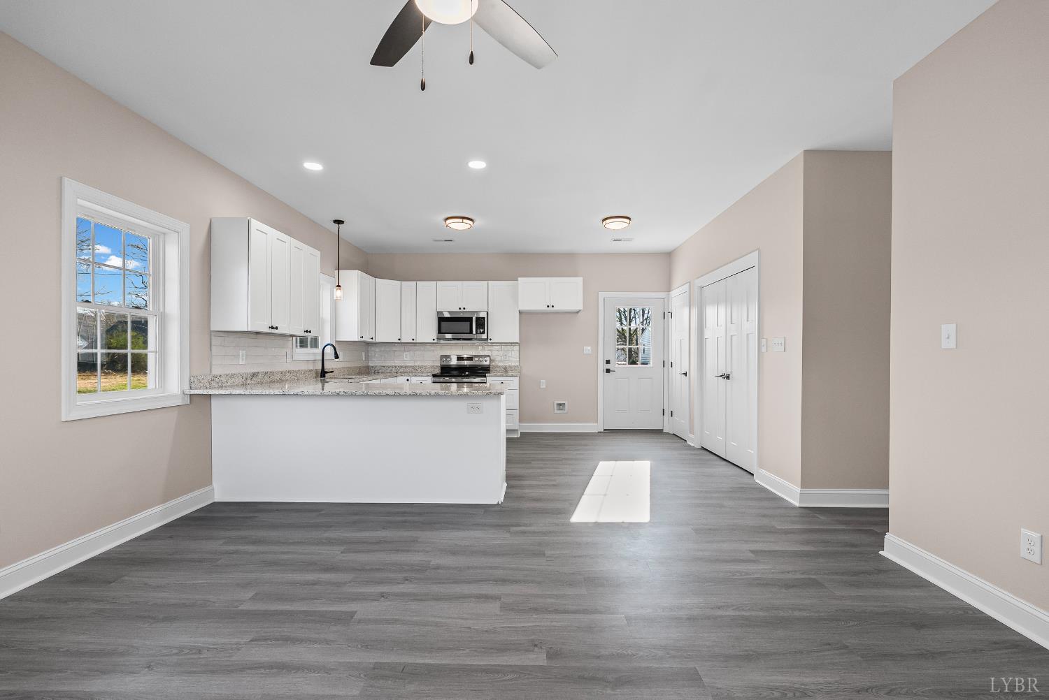 1303 4th Street Altavista, VA 24517 - Photo 4 of 36 a view of kitchen with wooden floors and refrigerator