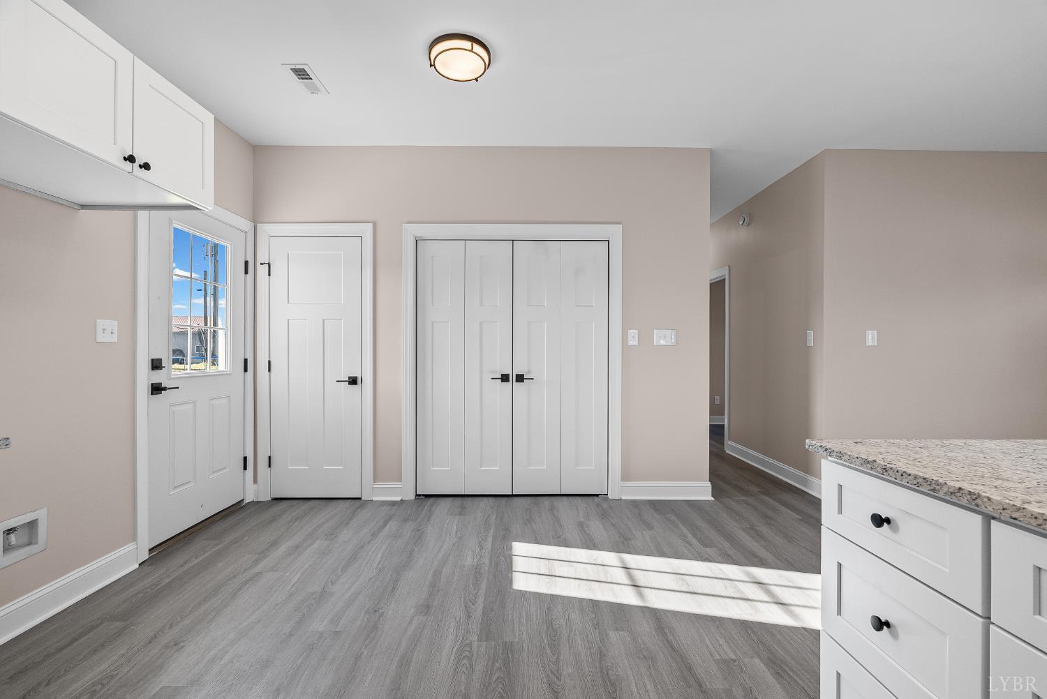 1303 4th Street Altavista, VA 24517 - Photo 10 of 36 an empty room with wooden floor