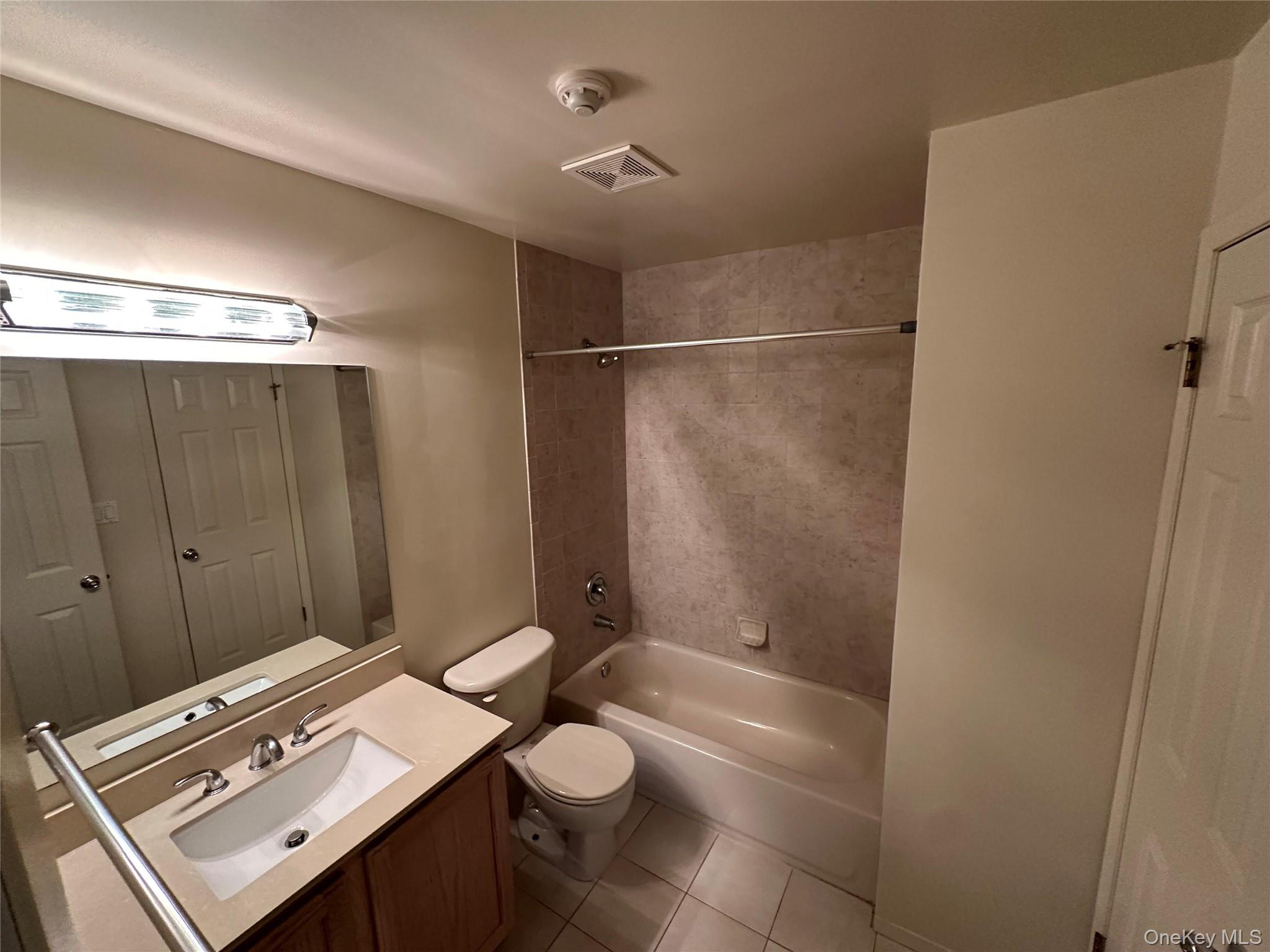 328 Prairie Court Manorville, NY 11949 - Photo 10 of 19 a bathroom with a shower toilet and sink