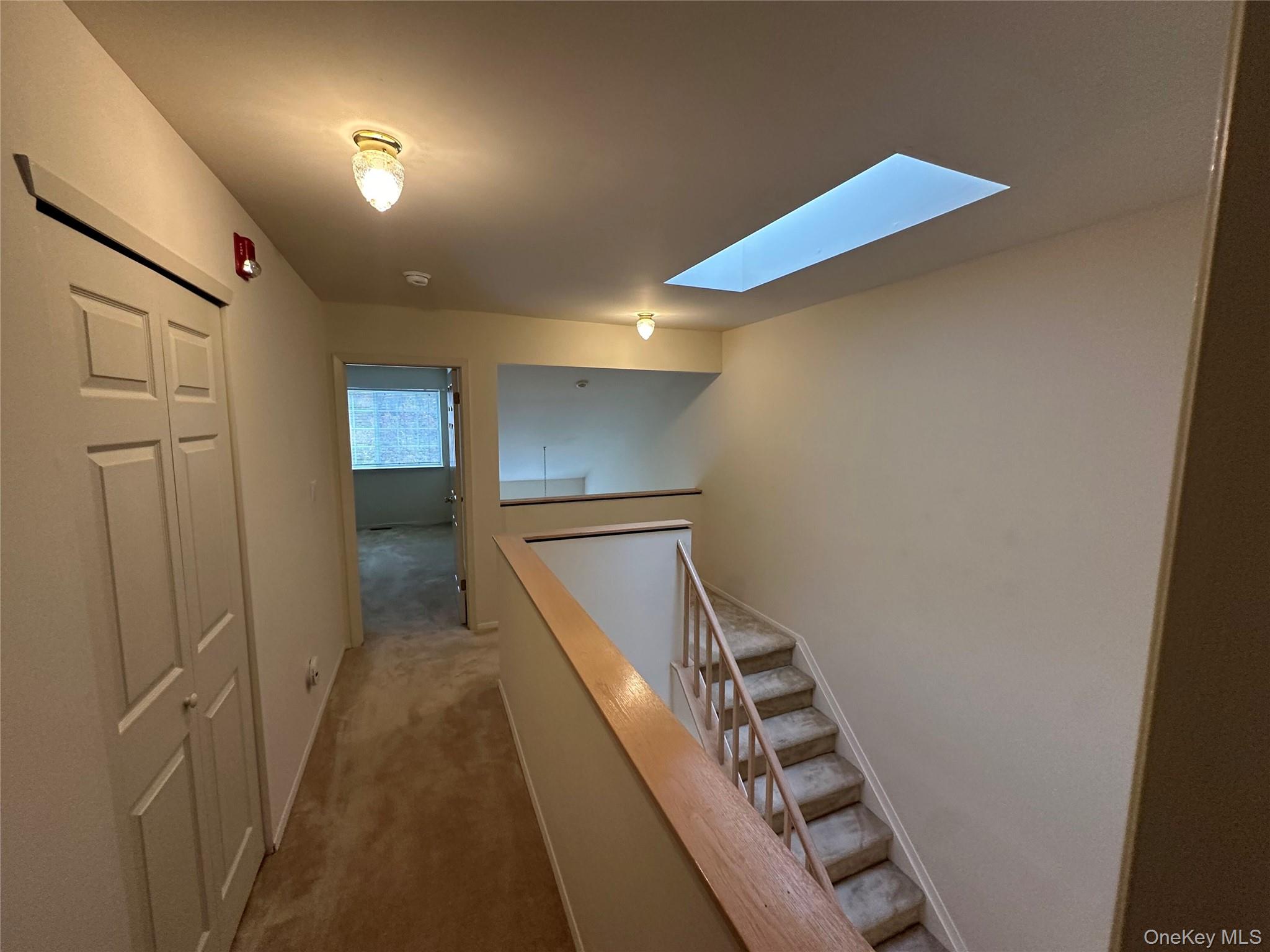 328 Prairie Court Manorville, NY 11949 - Photo 11 of 19 a view of hallway with stairs