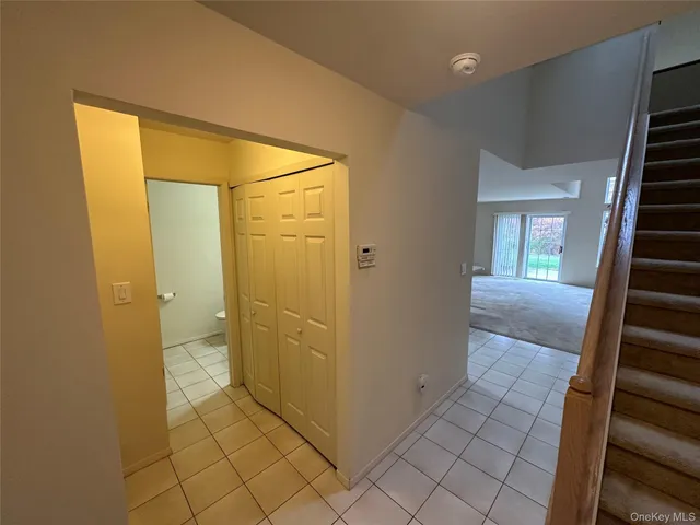 a bathroom with a shower and a sink