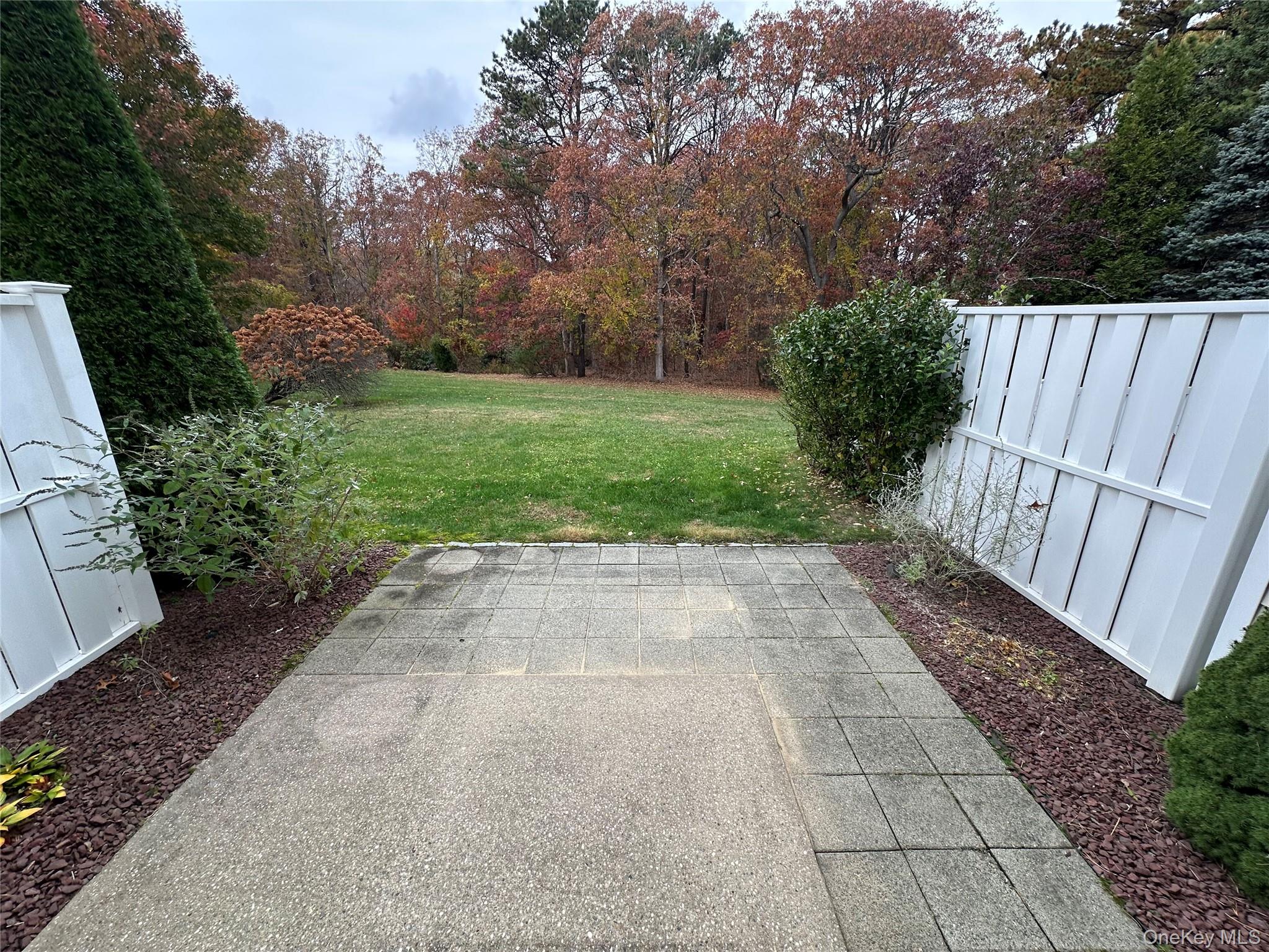 328 Prairie Court Manorville, NY 11949 - Photo 2 of 19 a view of backyard with green space