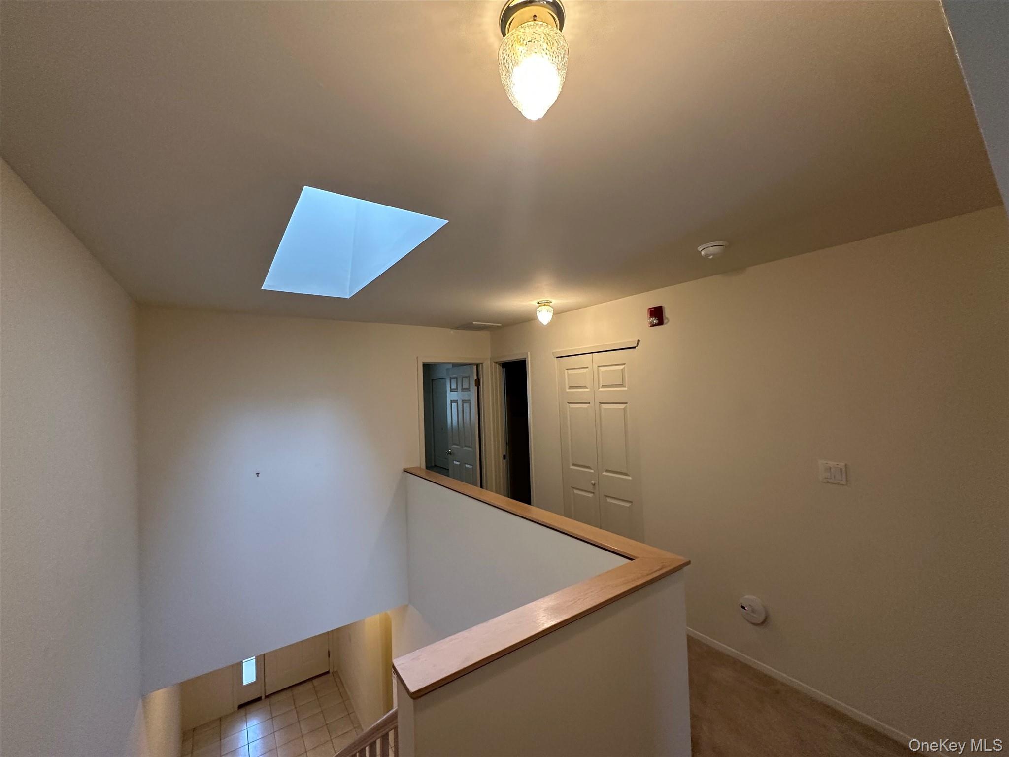 328 Prairie Court Manorville, NY 11949 - Photo 6 of 19 a view of a hallway with entryway