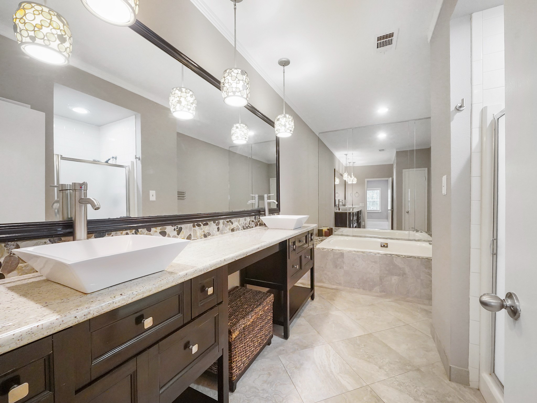 6000 Reims Road, Unit 2205 Houston, TX 77036 - Photo 19 of 35 Primary suite bath offering double sinks and ample counter space.