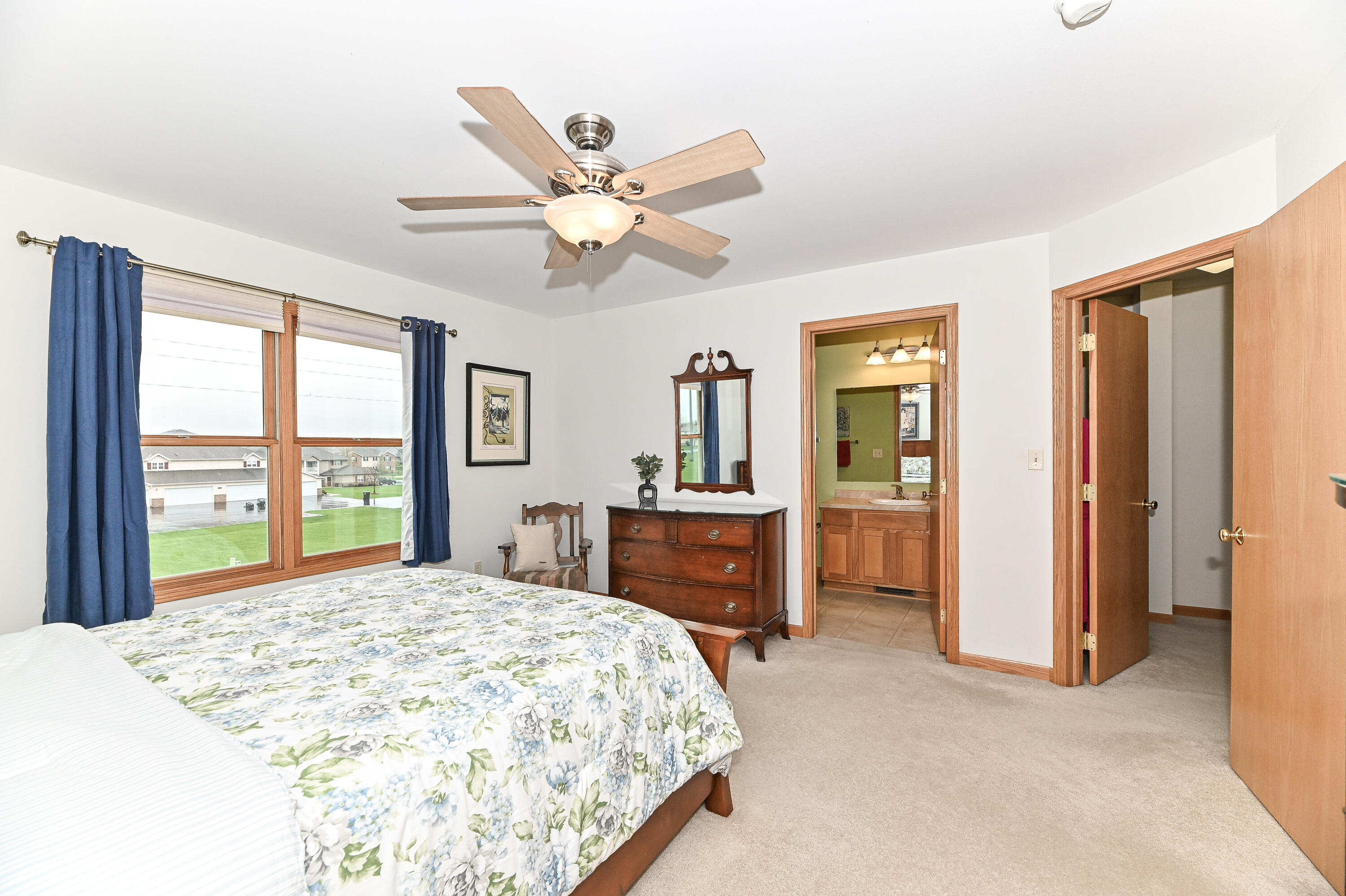 1736 Raintree Lane, Unit 47 Mount Pleasant, WI 53406 - Photo 24 of 51 Primary Ensuite