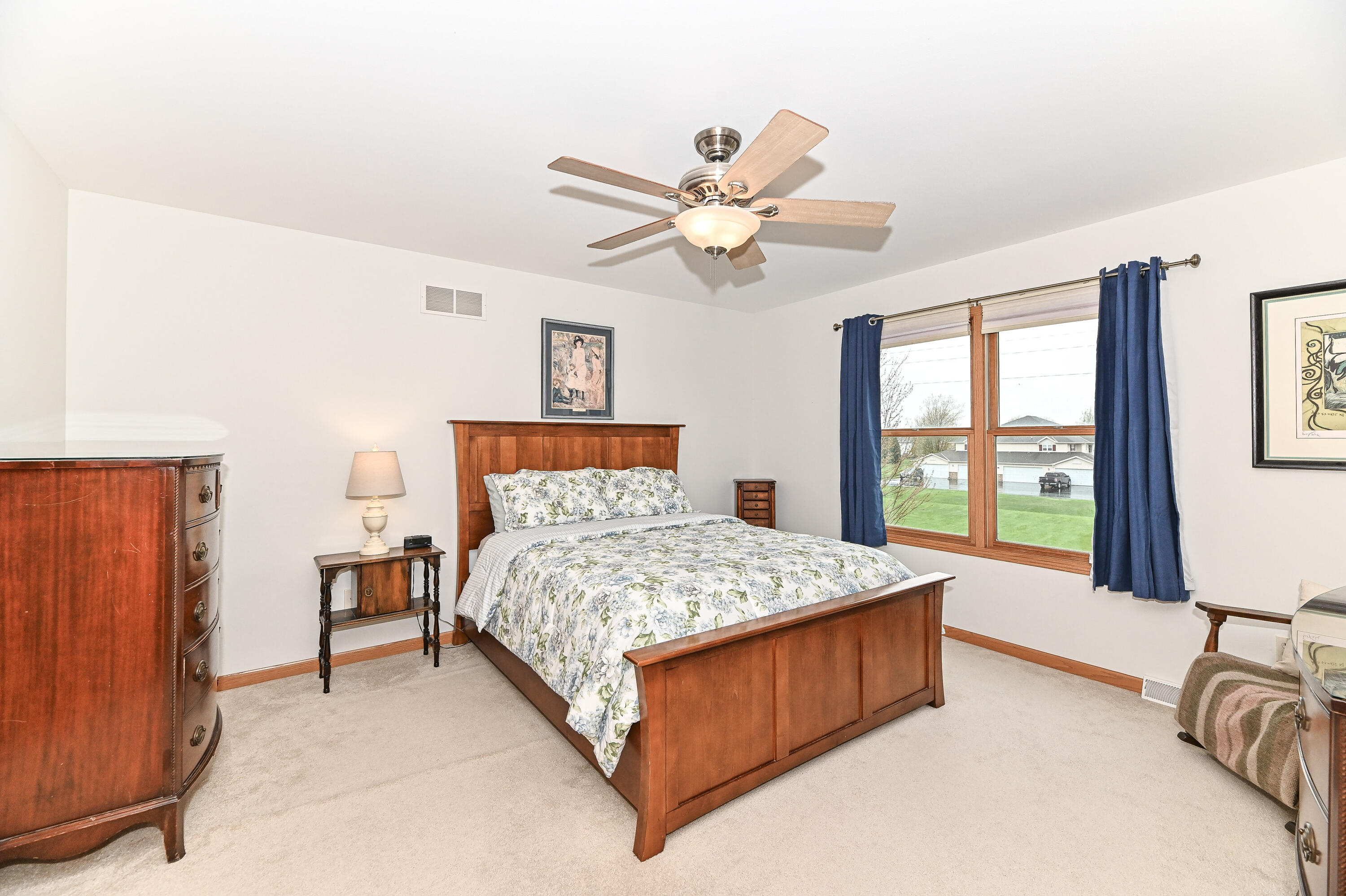 1736 Raintree Lane, Unit 47 Mount Pleasant, WI 53406 - Photo 25 of 51 Primary Ensuite