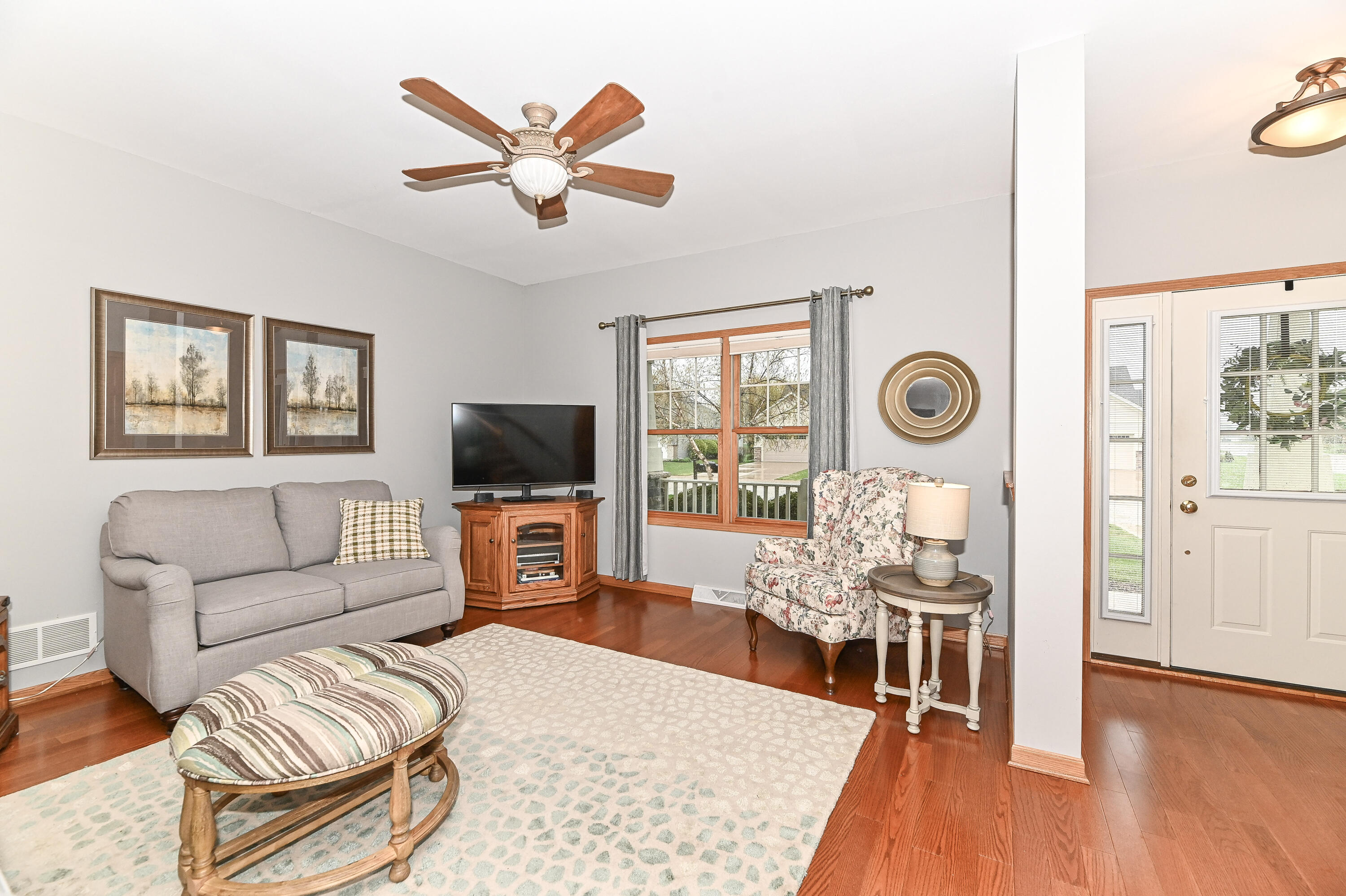 1736 Raintree Lane, Unit 47 Mount Pleasant, WI 53406 - Photo 6 of 51 Living Room