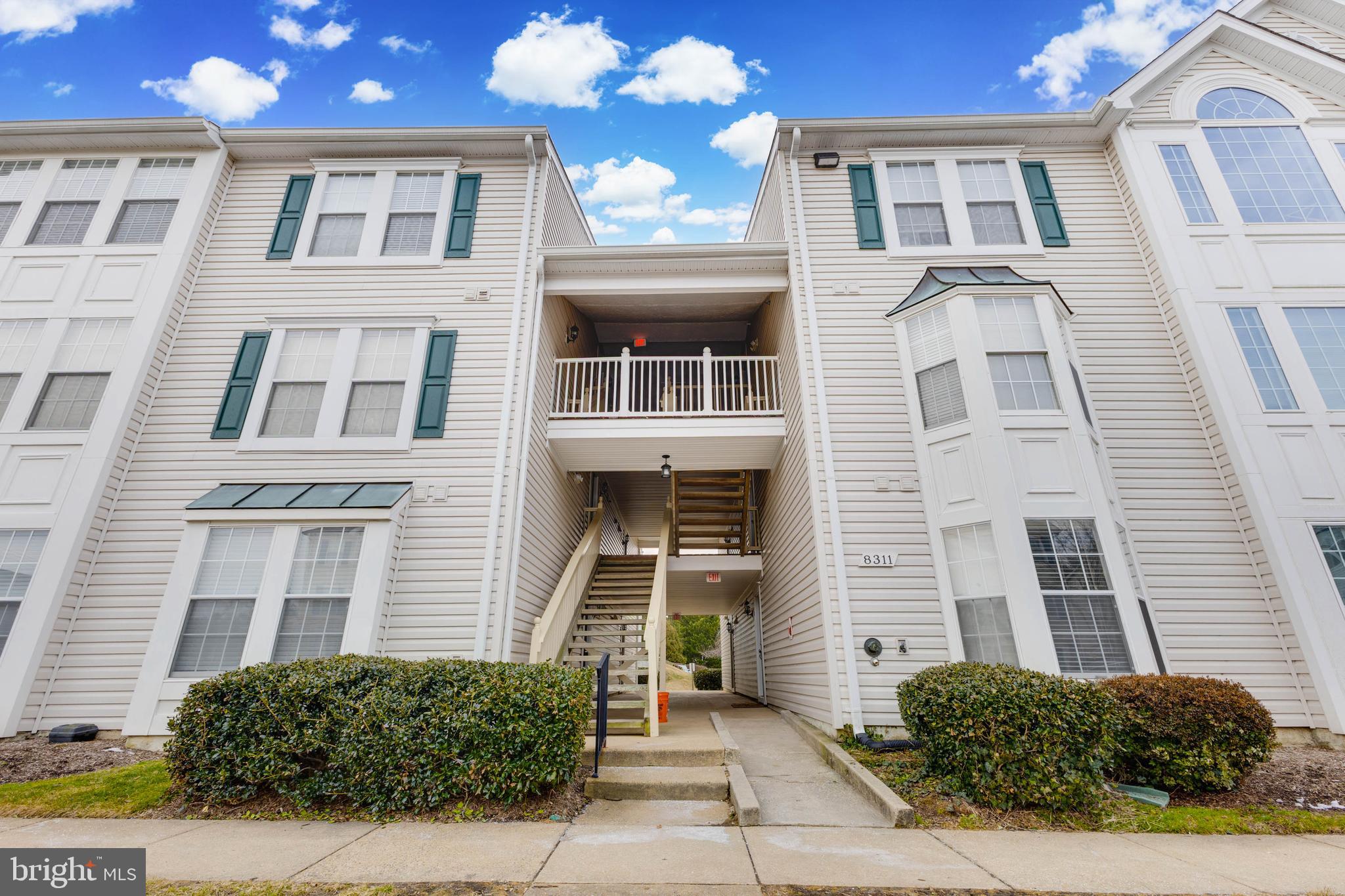 8311 Bluebird Way, Unit K Lorton, VA 22079 - Photo 1 of 25 a front view of a house