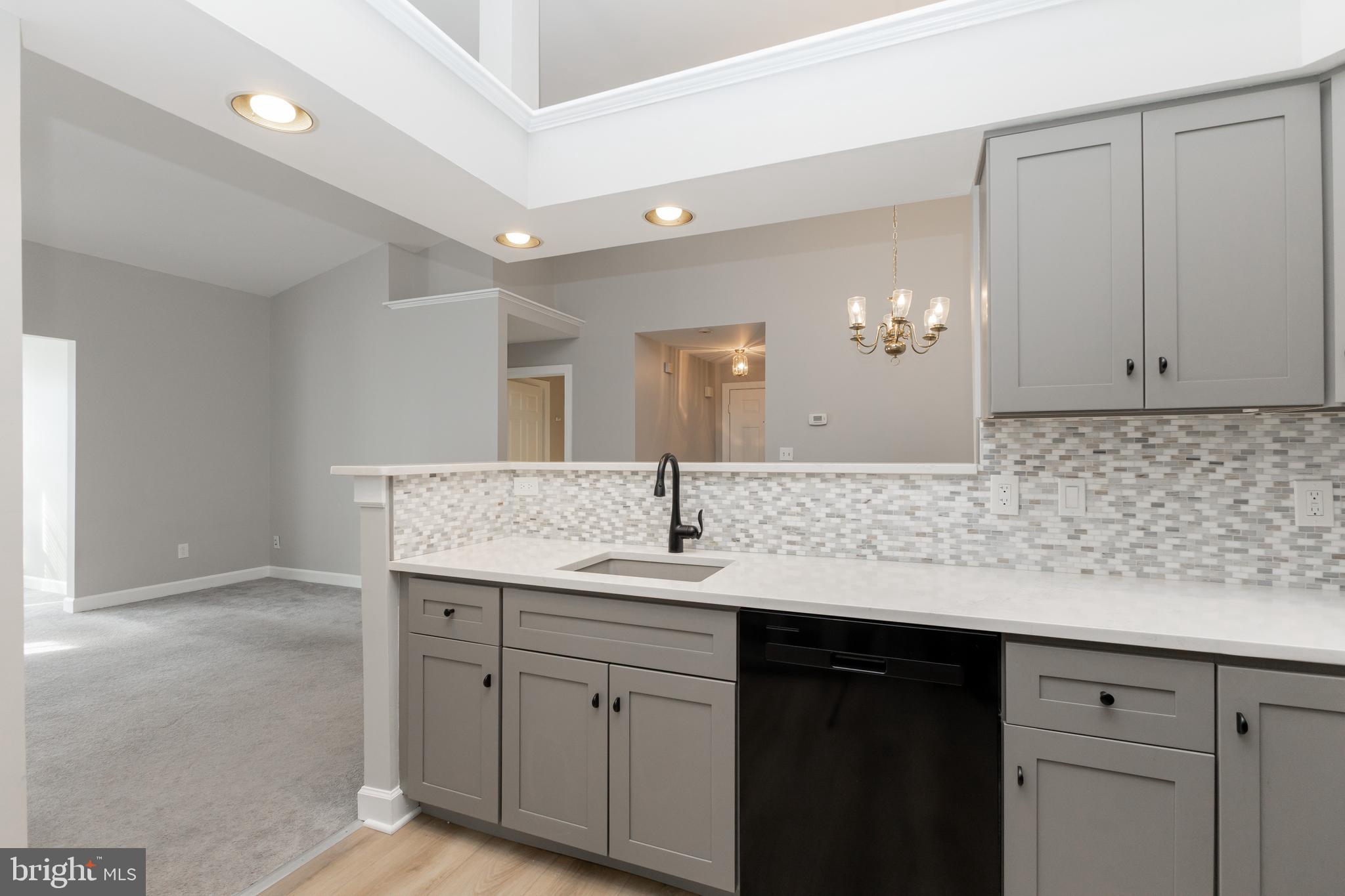 8311 Bluebird Way, Unit K Lorton, VA 22079 - Photo 14 of 25 a bathroom with a sink and a mirror