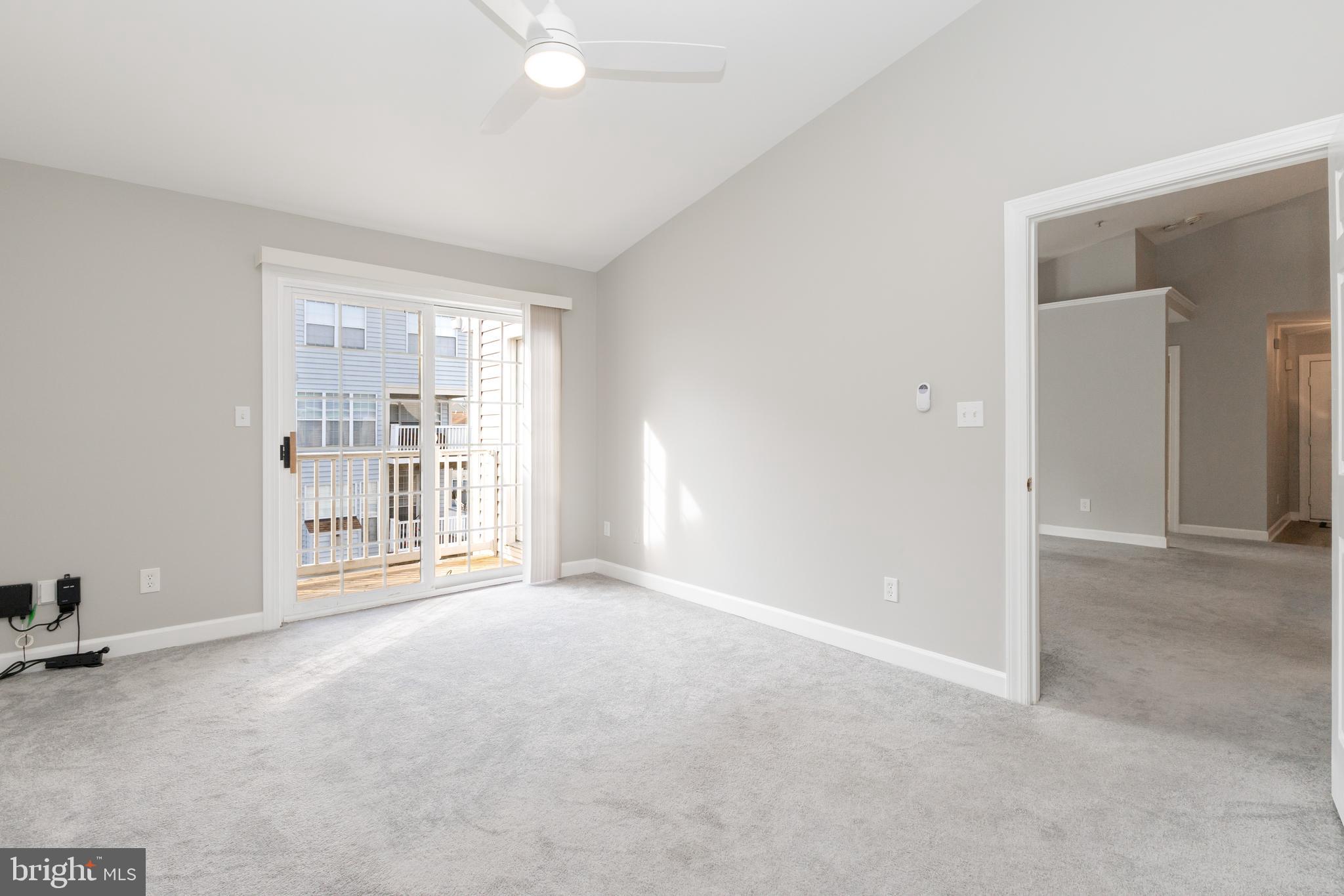 8311 Bluebird Way, Unit K Lorton, VA 22079 - Photo 16 of 25 a view of an empty room with a window