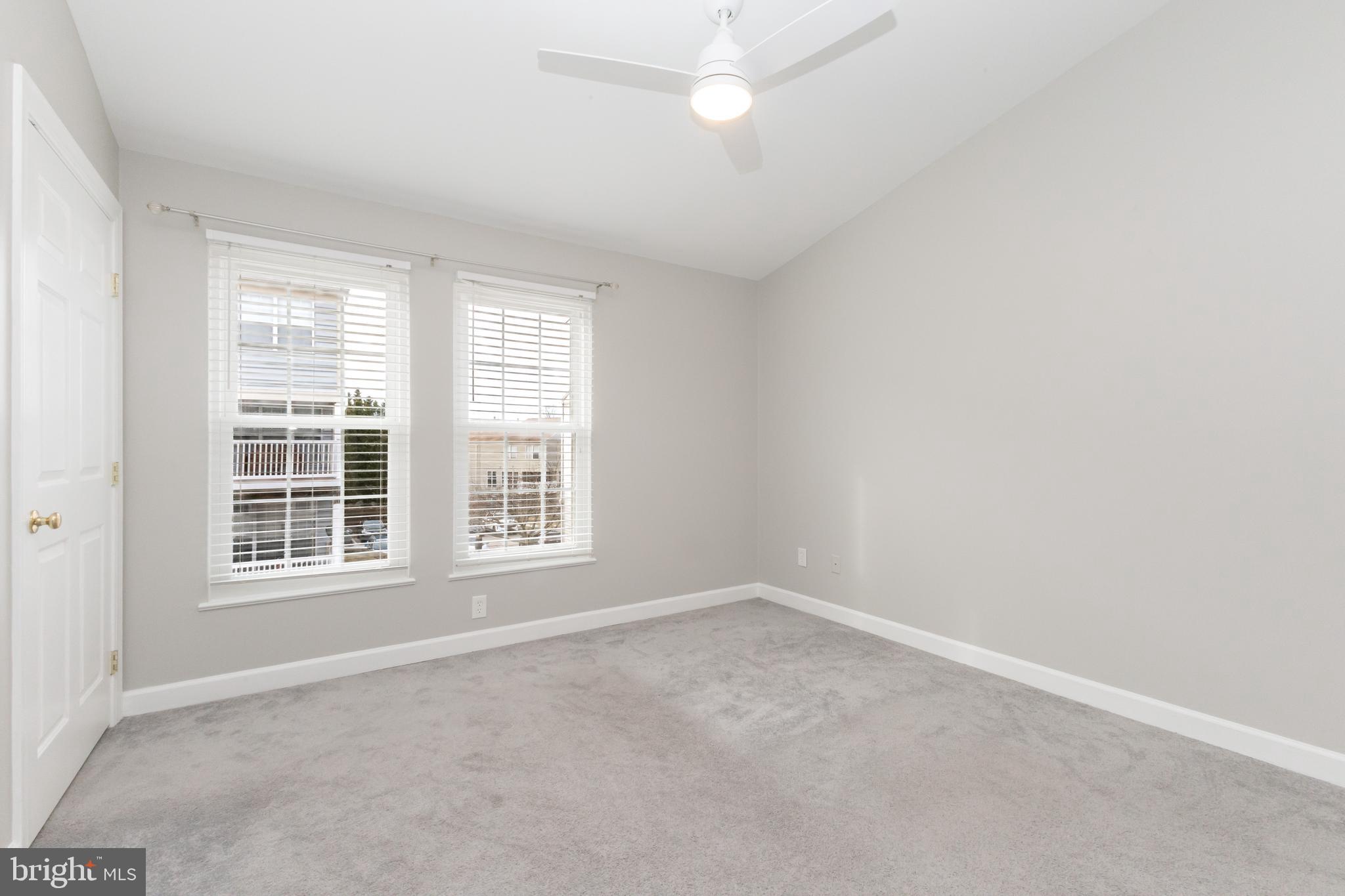 8311 Bluebird Way, Unit K Lorton, VA 22079 - Photo 20 of 25 an empty room with a window