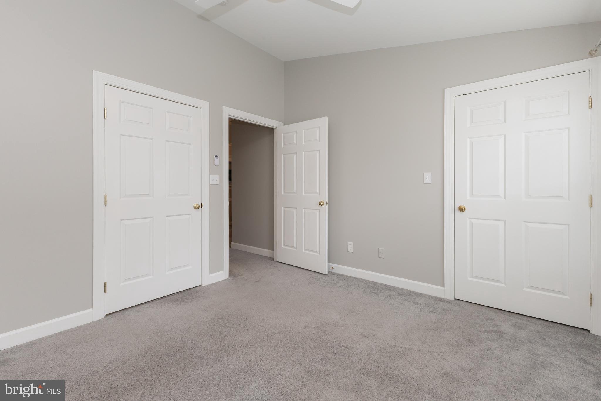 8311 Bluebird Way, Unit K Lorton, VA 22079 - Photo 21 of 25 an empty room with closet area