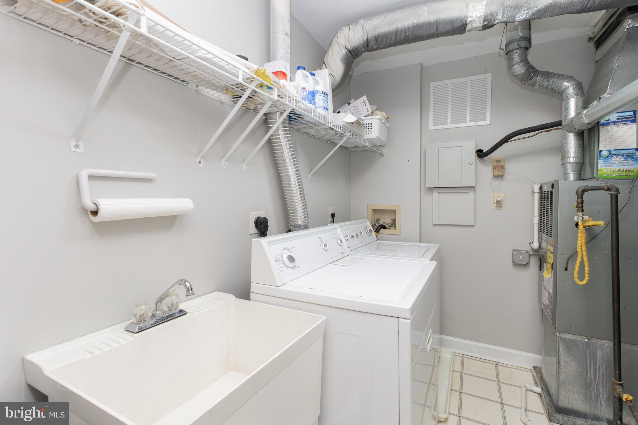 8311 Bluebird Way, Unit K Lorton, VA 22079 - Photo 23 of 25 a utility room with dryer and washer