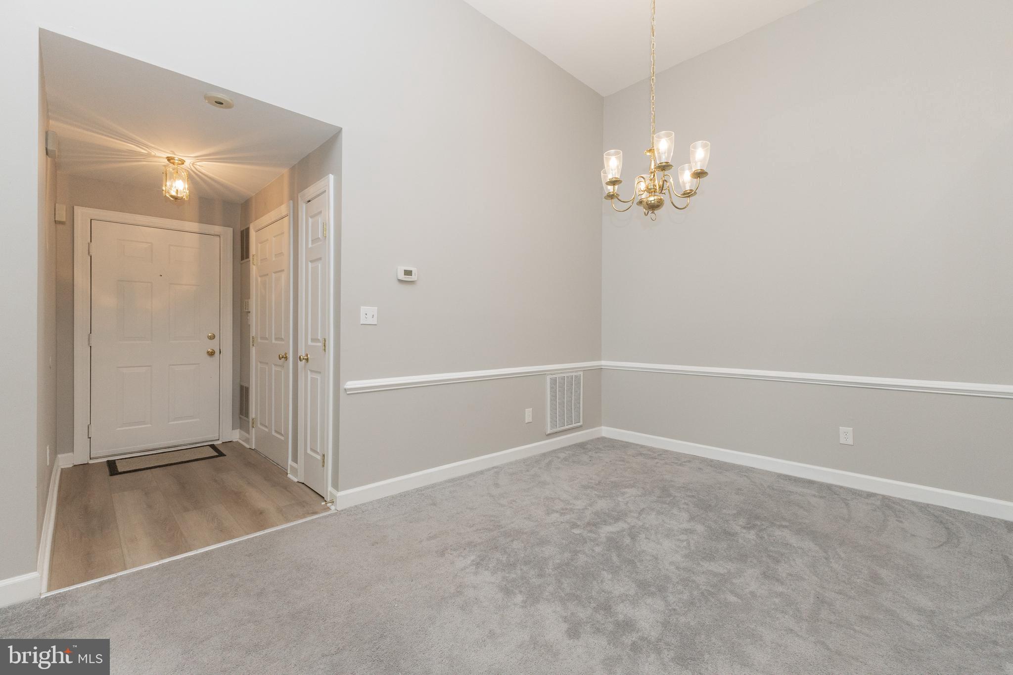 8311 Bluebird Way, Unit K Lorton, VA 22079 - Photo 4 of 25 wooden floor in an empty room
