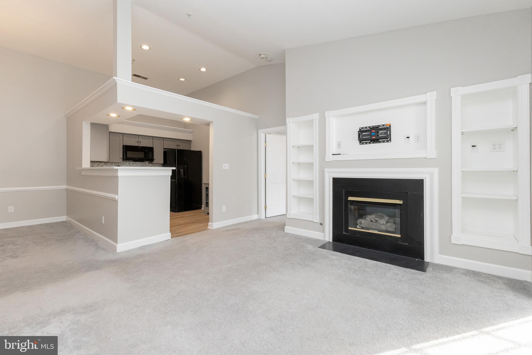 8311 Bluebird Way, Unit K Lorton, VA 22079 - Photo 6 of 25 a view of a livingroom with a fireplace