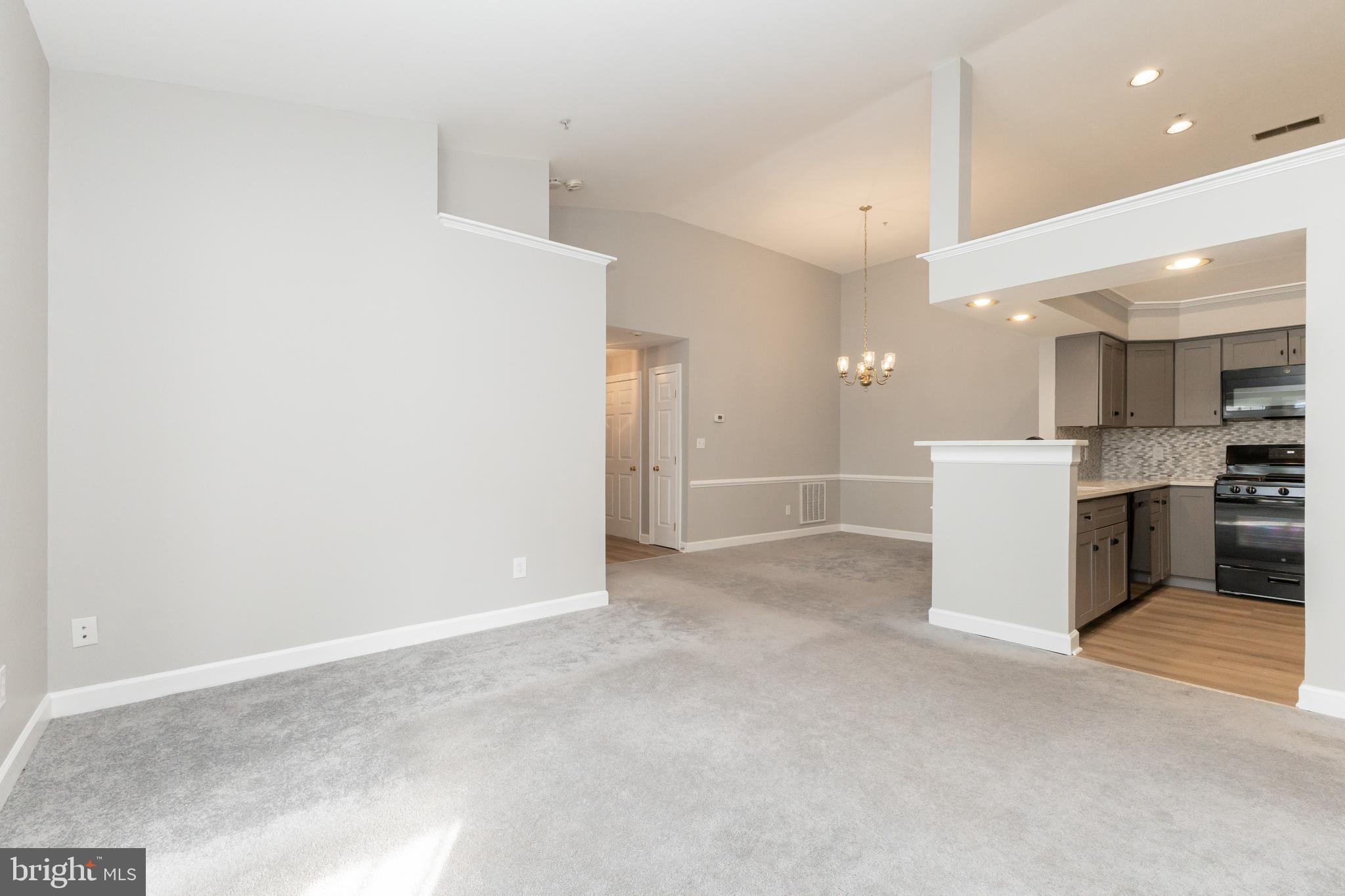 8311 Bluebird Way, Unit K Lorton, VA 22079 - Photo 7 of 25 a view of a kitchen with a sink