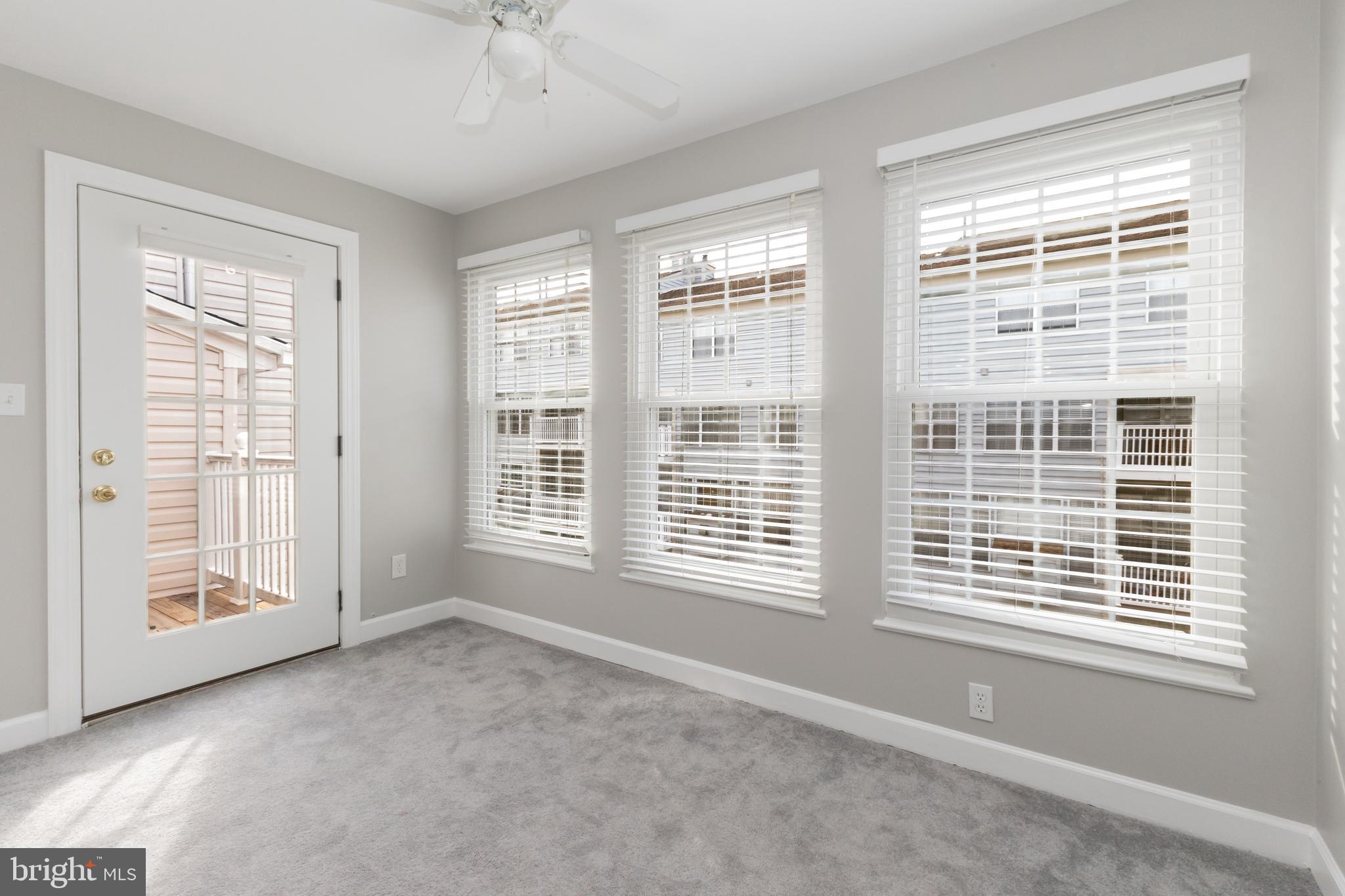 8311 Bluebird Way, Unit K Lorton, VA 22079 - Photo 8 of 25 a view of an empty room with a window
