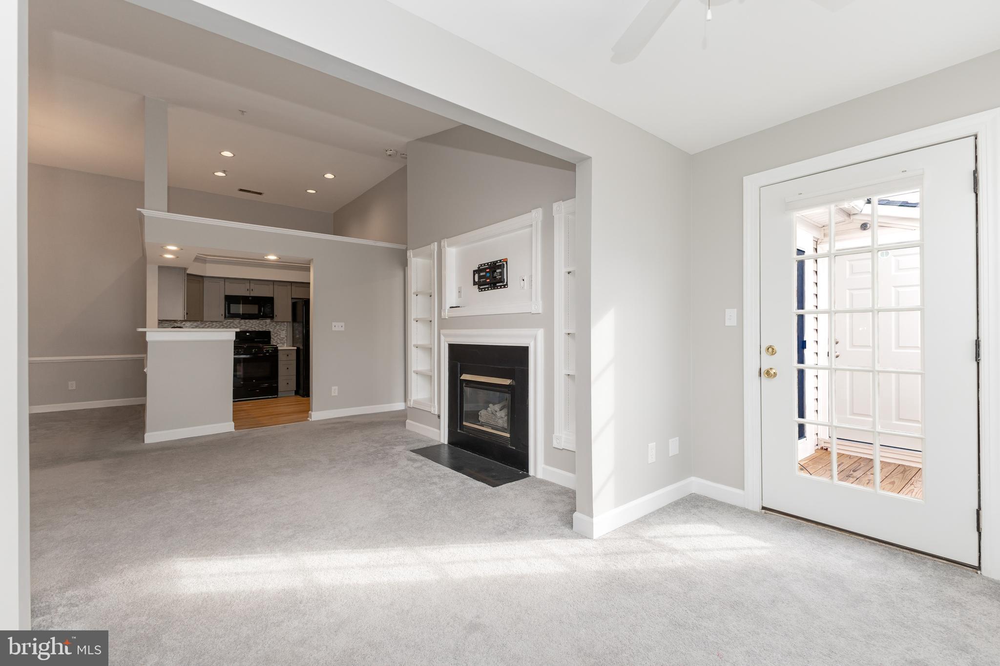 8311 Bluebird Way, Unit K Lorton, VA 22079 - Photo 9 of 25 a view of a livingroom with a fireplace