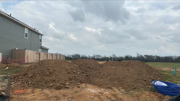 a view of a lake next to a building