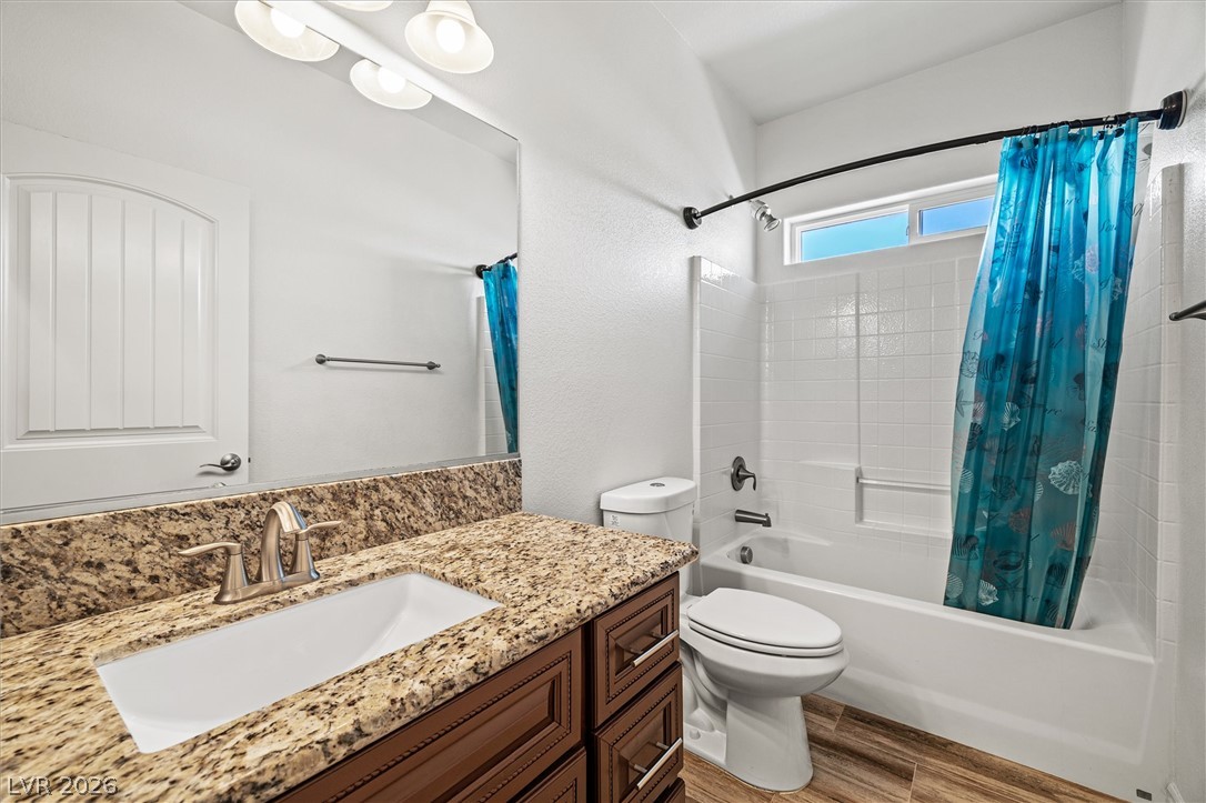 6720 Stubblefield Drive Pahrump, NV 89061 - Photo 20 of 51 A well-appointed bathroom offers a vanity with ample storage and a bright shower.