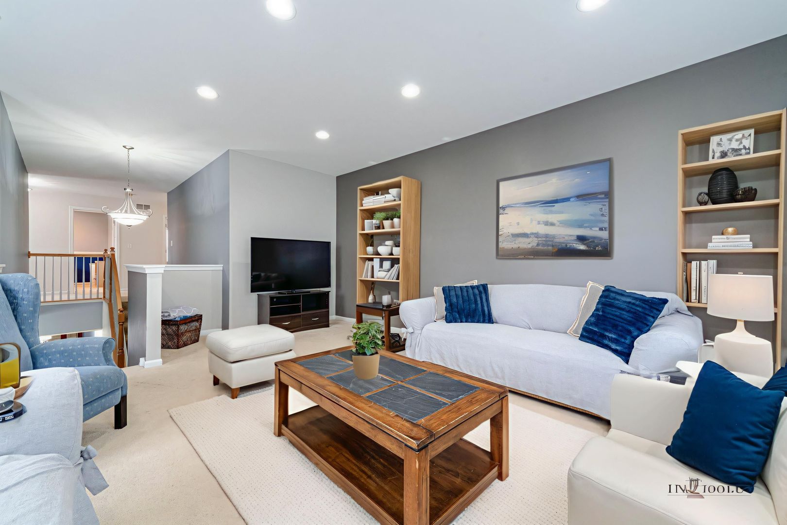 683 Niagara Drive Volo, IL 60073 - Photo 16 of 25 a living room with furniture and a flat screen tv