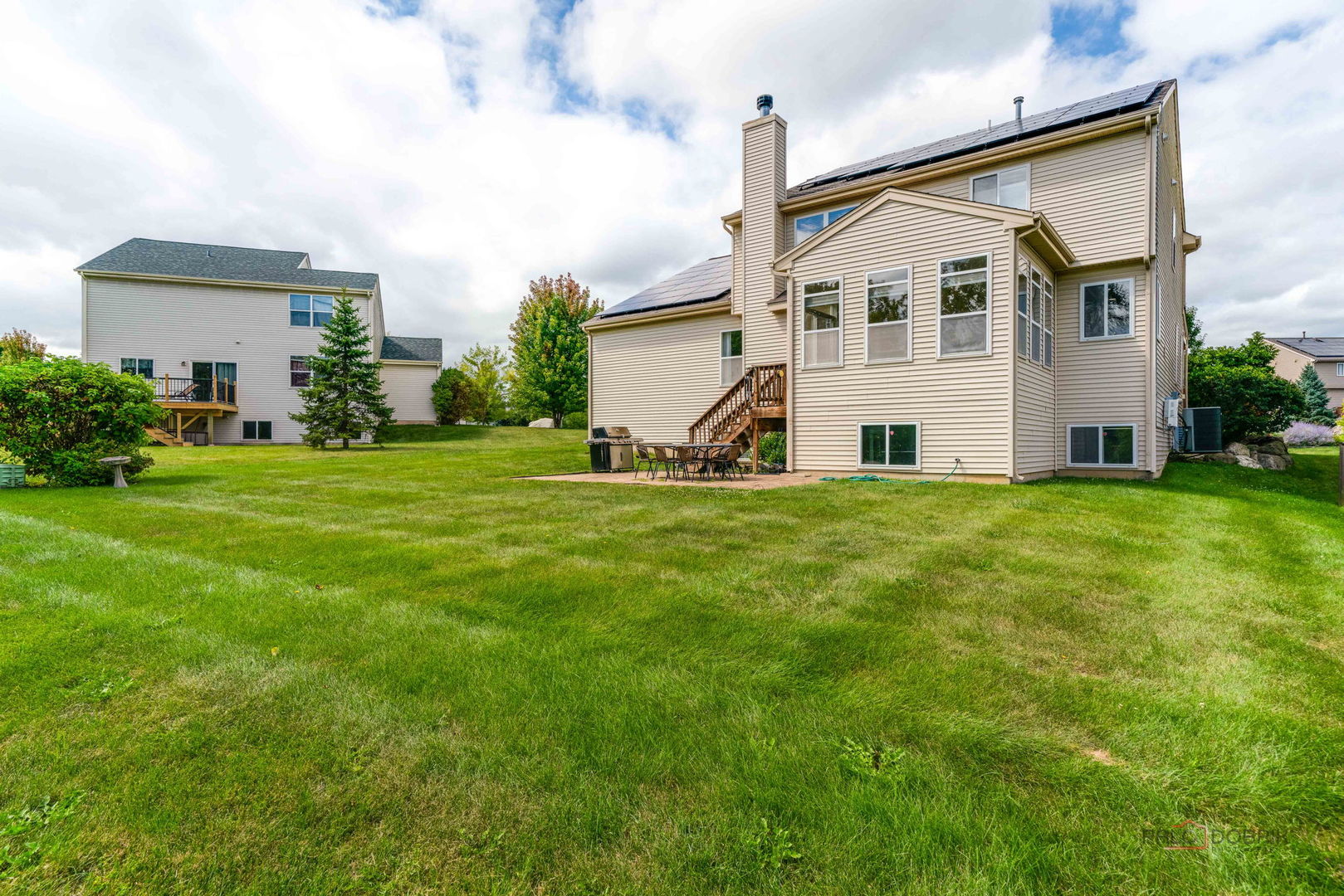 683 Niagara Drive Volo, IL 60073 - Photo 21 of 25 a view of a house with a yard
