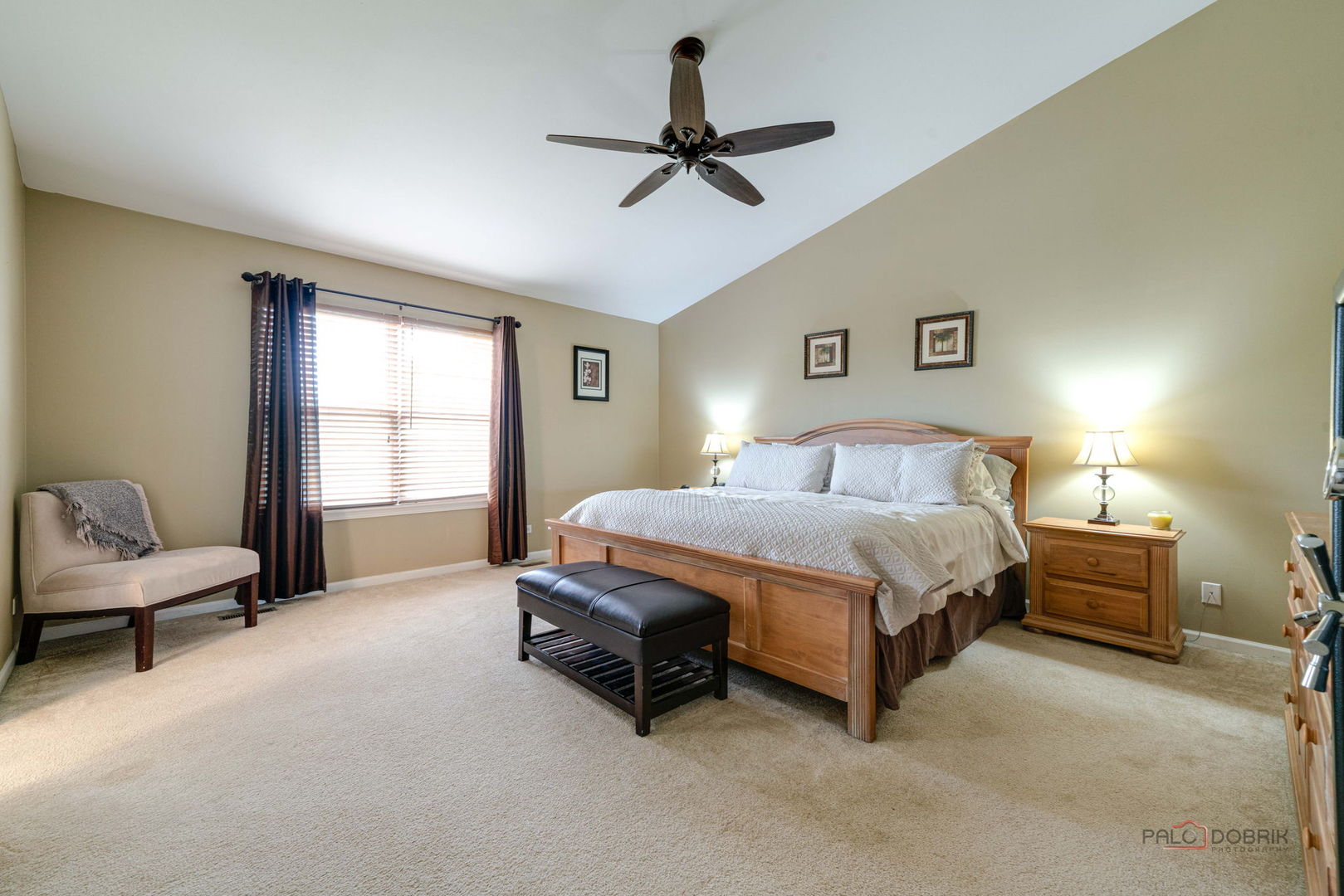 683 Niagara Drive Volo, IL 60073 - Photo 10 of 25 a bedroom with a bed a couch and a window