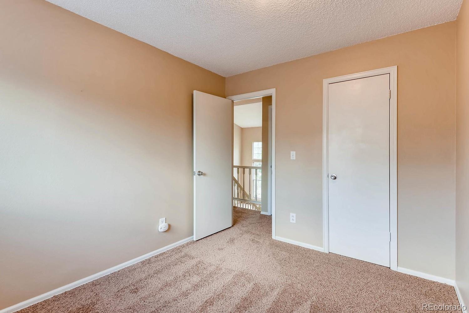 2874 South Genoa Street Aurora, CO 80013 - Photo 14 of 22 a view of an empty room