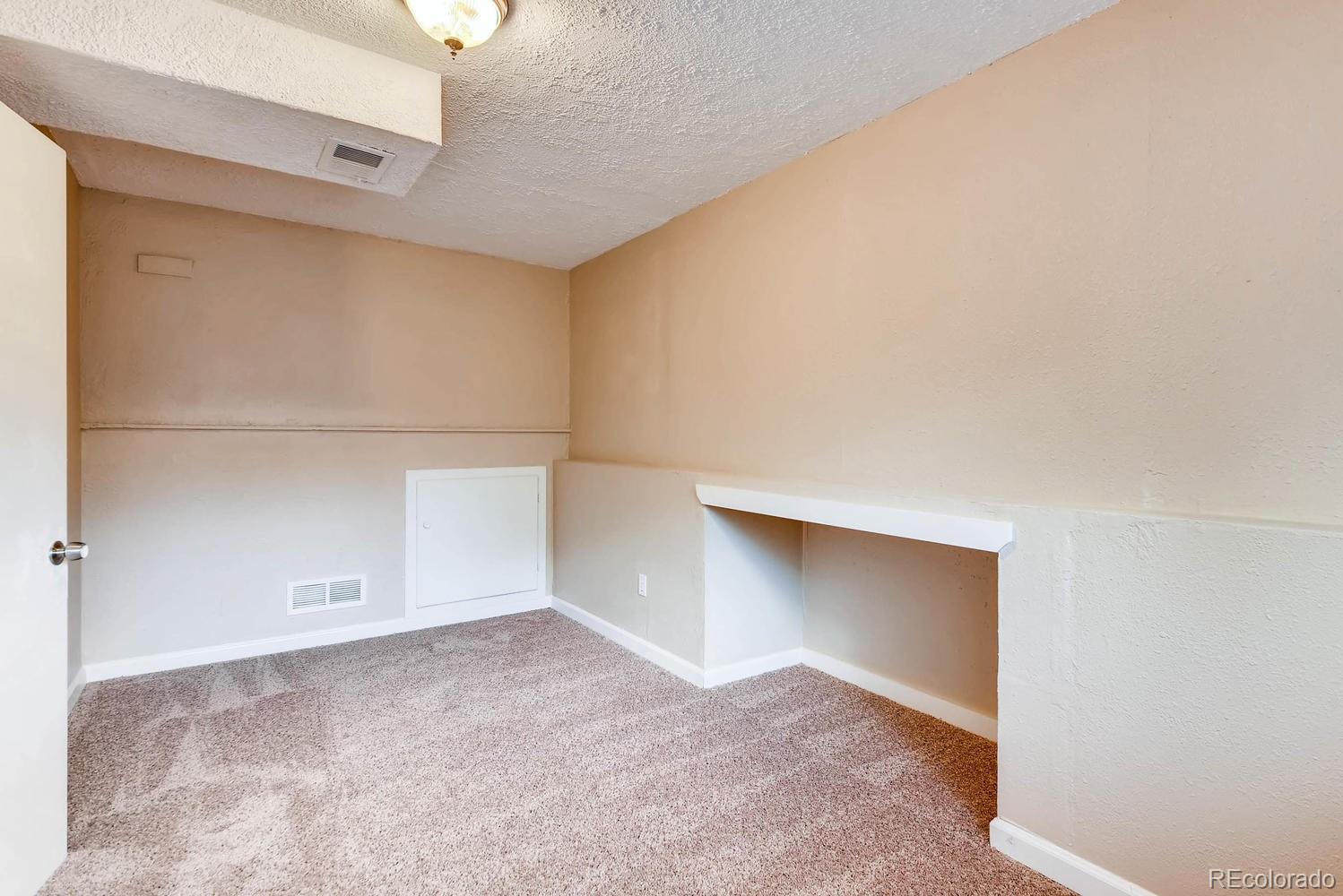 2874 South Genoa Street Aurora, CO 80013 - Photo 19 of 22 a view of an empty room