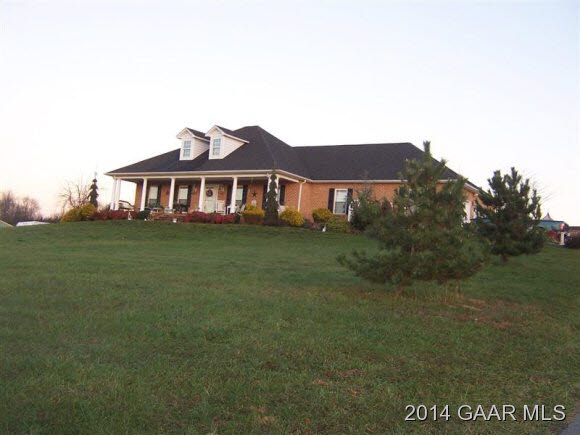 699 Barnhart Road Fort Defiance, VA 24437 - Photo 1 of 26 a front view of a house with a garden