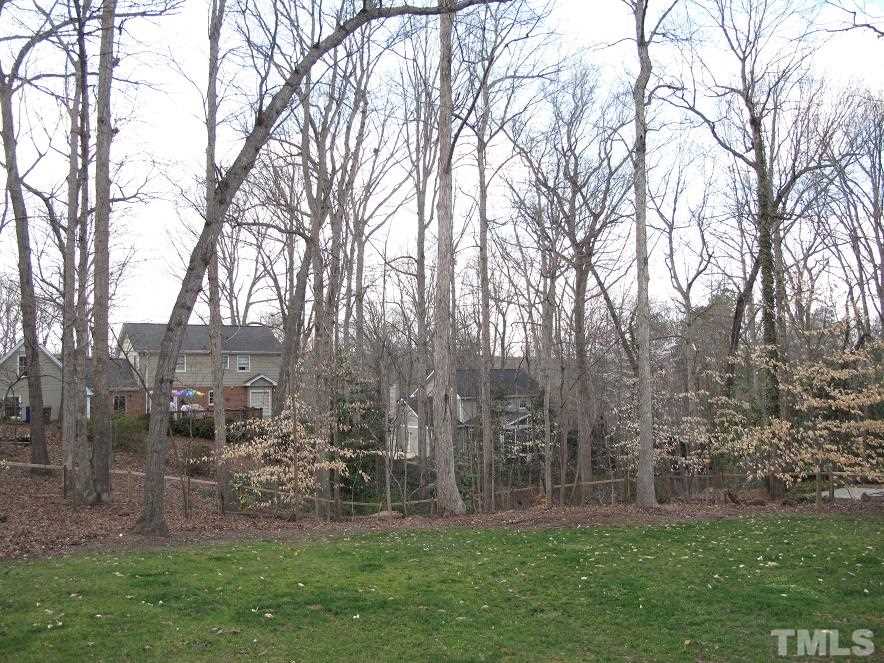 2405 Tyson Street Raleigh, NC 27612 - Photo 22 of 24 a view of a house with a yard