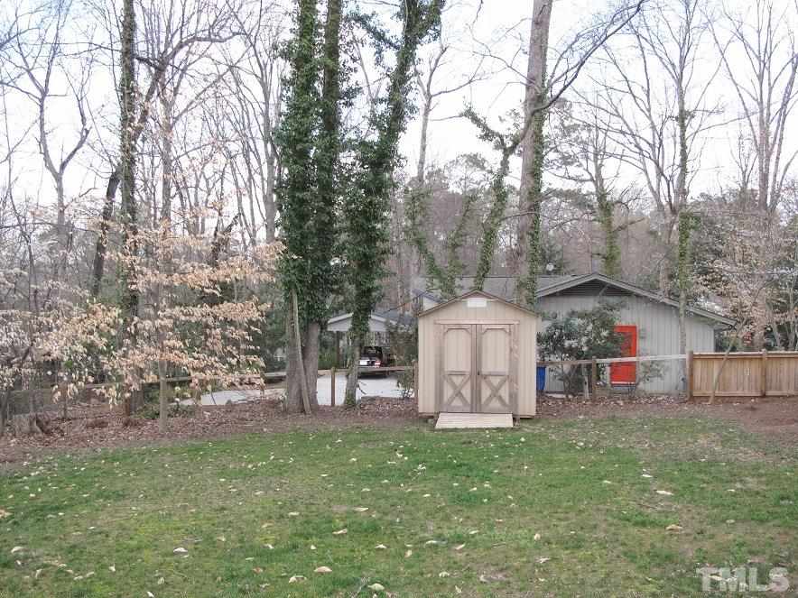 2405 Tyson Street Raleigh, NC 27612 - Photo 23 of 24 a front view of a house with garden