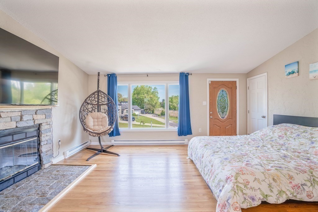 55 Gates Road Saugus, MA 01906 - Photo 12 of 42 a view of a bedroom with furniture and window