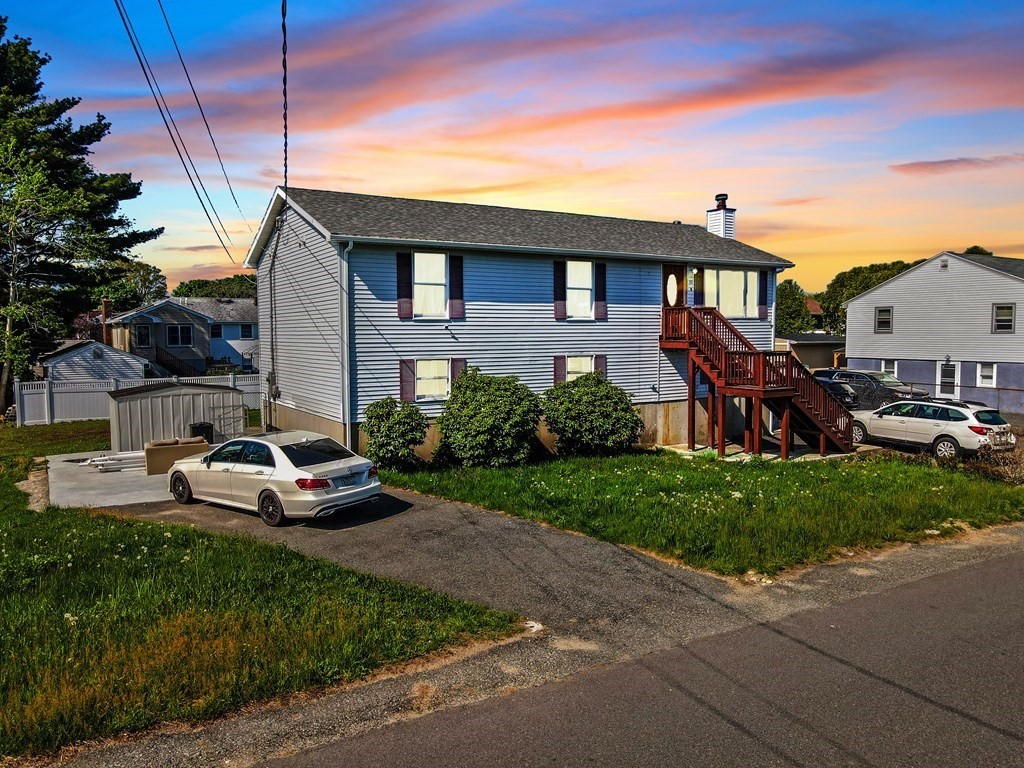 55 Gates Road Saugus, MA 01906 - Photo 2 of 42 a view of a house with a patio