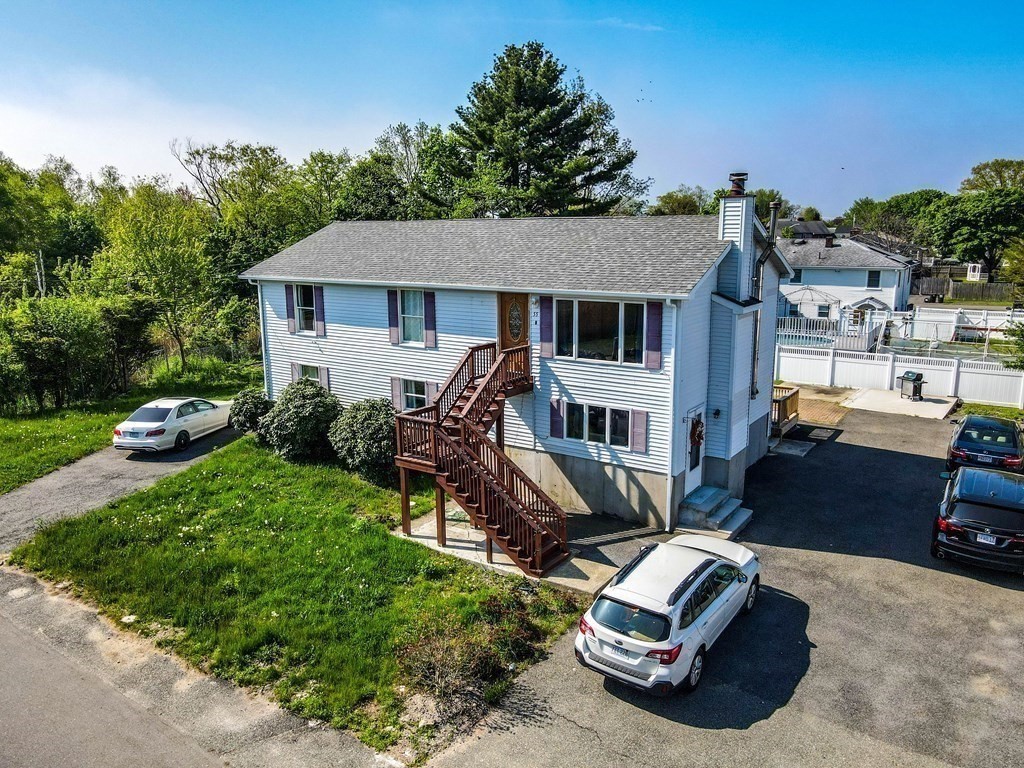 55 Gates Road Saugus, MA 01906 - Photo 38 of 42 a view of a car park in front of house