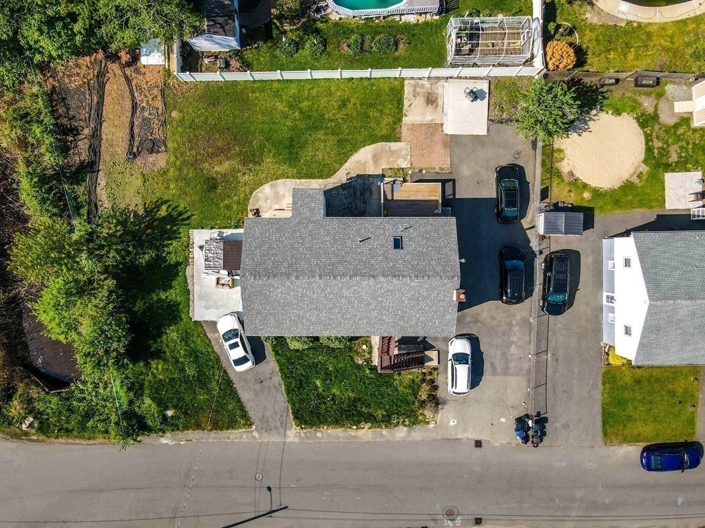 55 Gates Road Saugus, MA 01906 - Photo 40 of 42 an aerial view of multiple houses with outdoor space