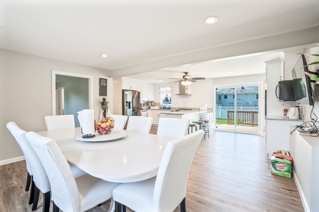 55 Gates Road Saugus, MA 01906 - Photo 5 of 42 a dining room with furniture and wooden floor